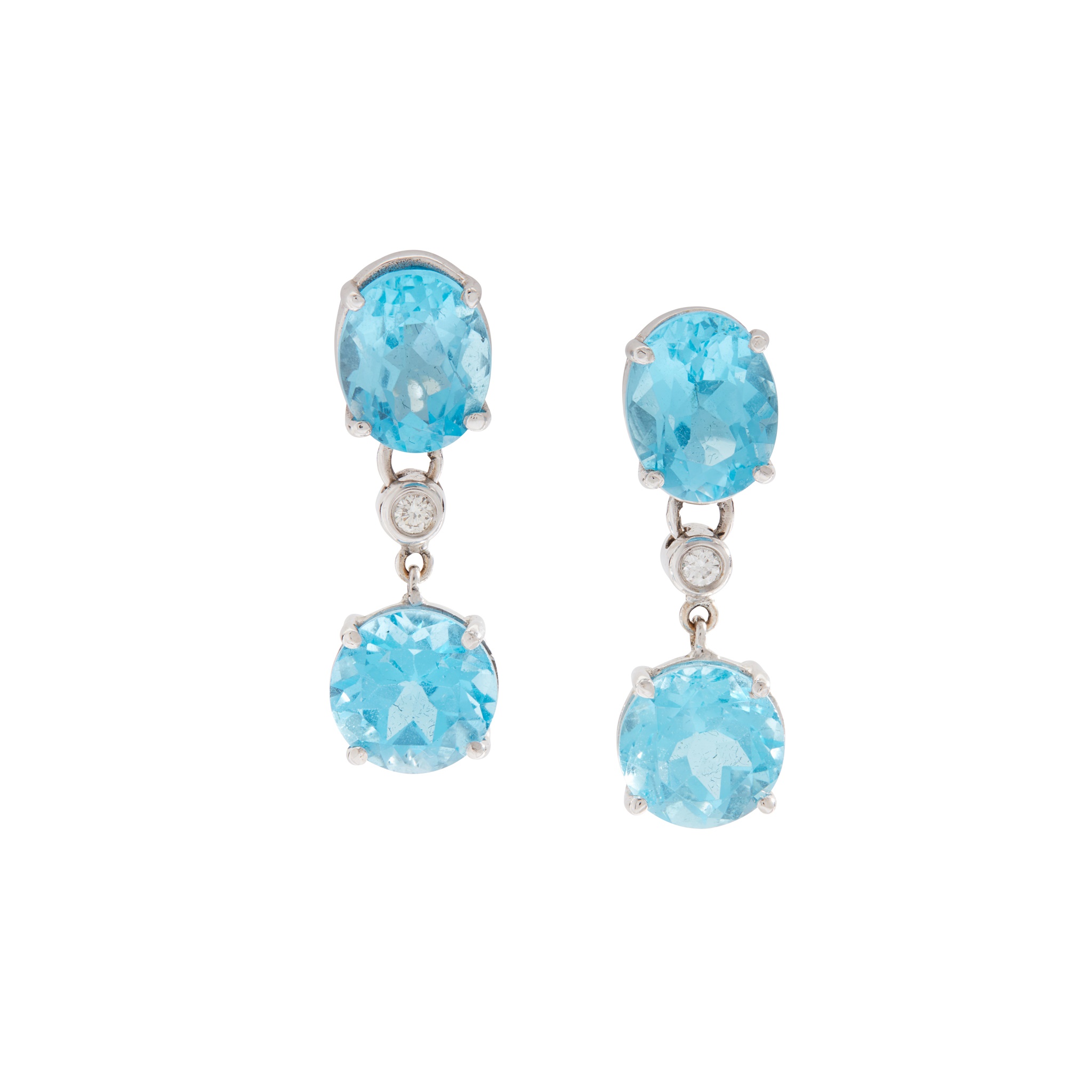A pair of blue topaz and diamond pendent earrings