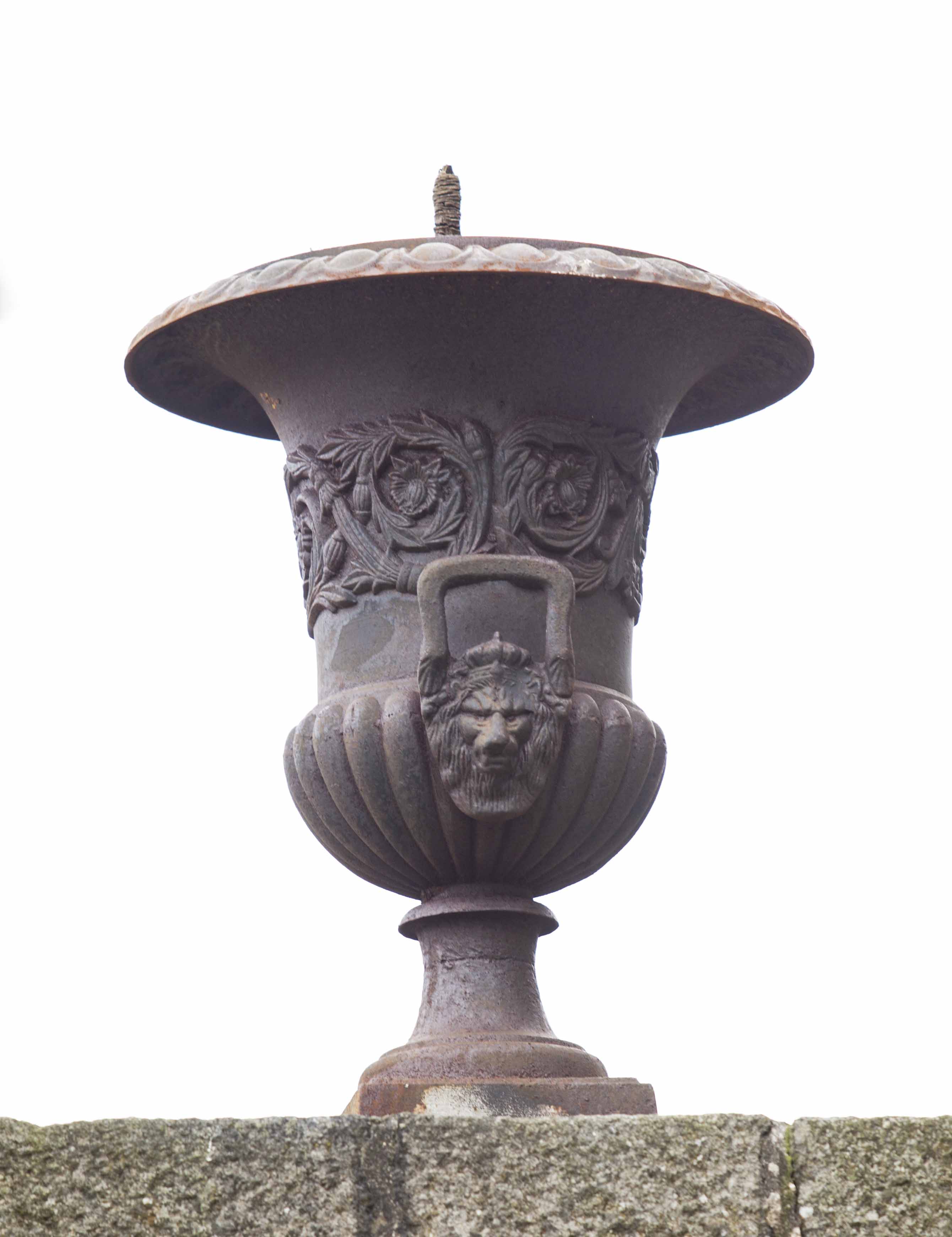 PAIR OF CAST IRON GARDEN URNS