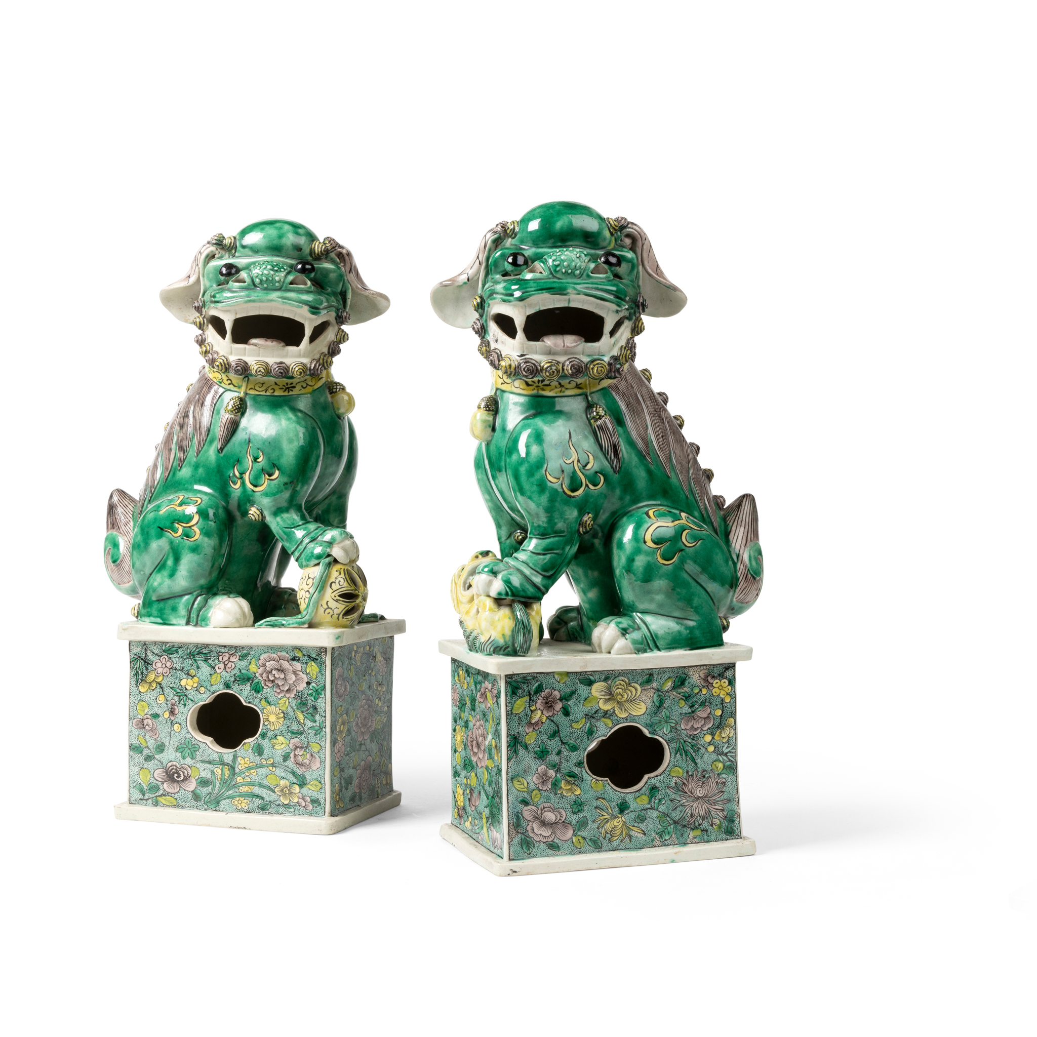 PAIR OF SANCAI-GLAZED BISCUIT BUDDHIST LIONS