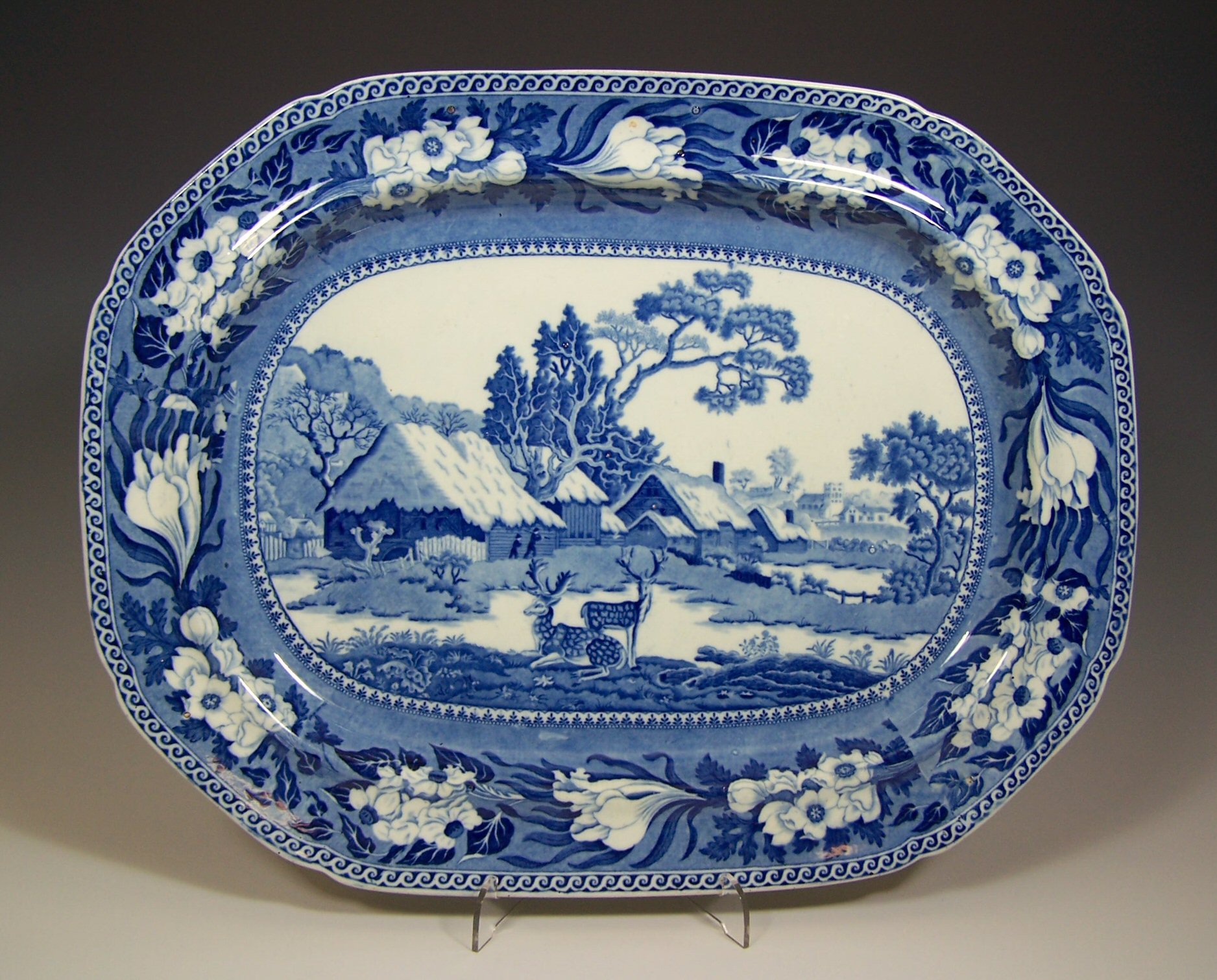 A Staffordshire 'Fallow Deer' pattern blue printed ashet, circa 1820 - 1830