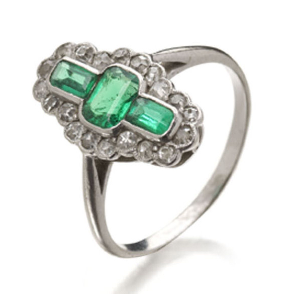 A Belle Epoque emerald and diamond set ring,
