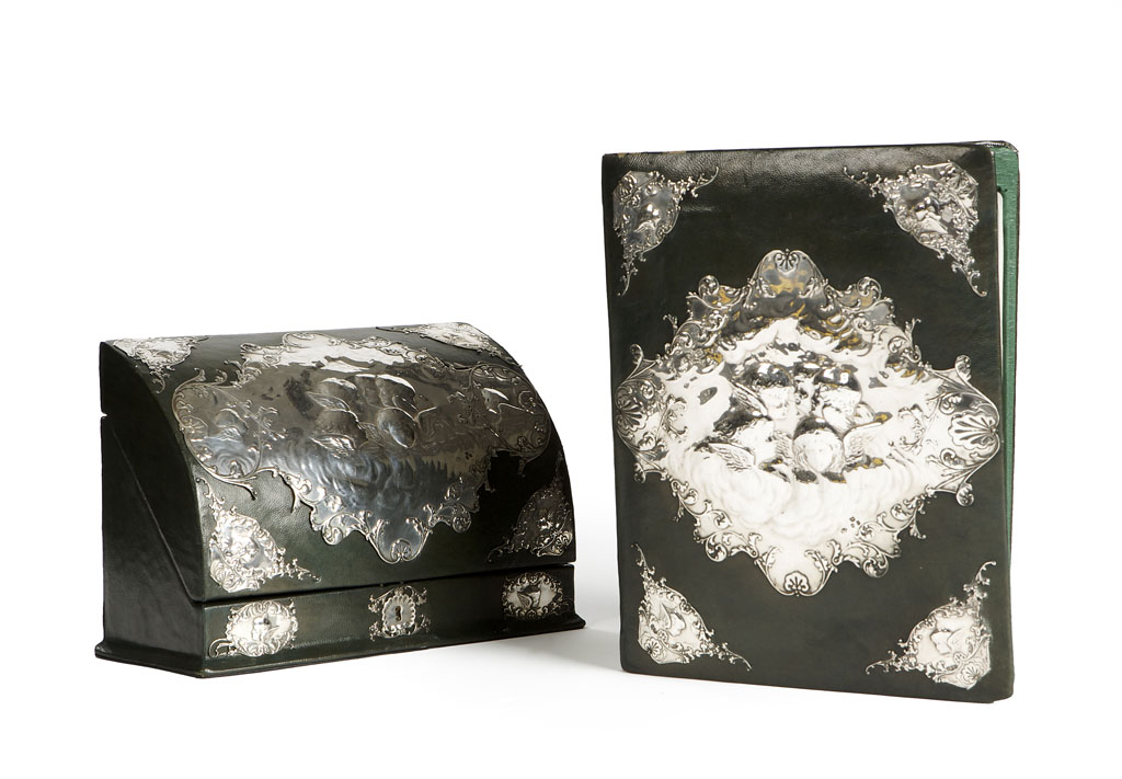 A Victorian silver-mounted stationery box and a blotter pad William Comyns, London 1900