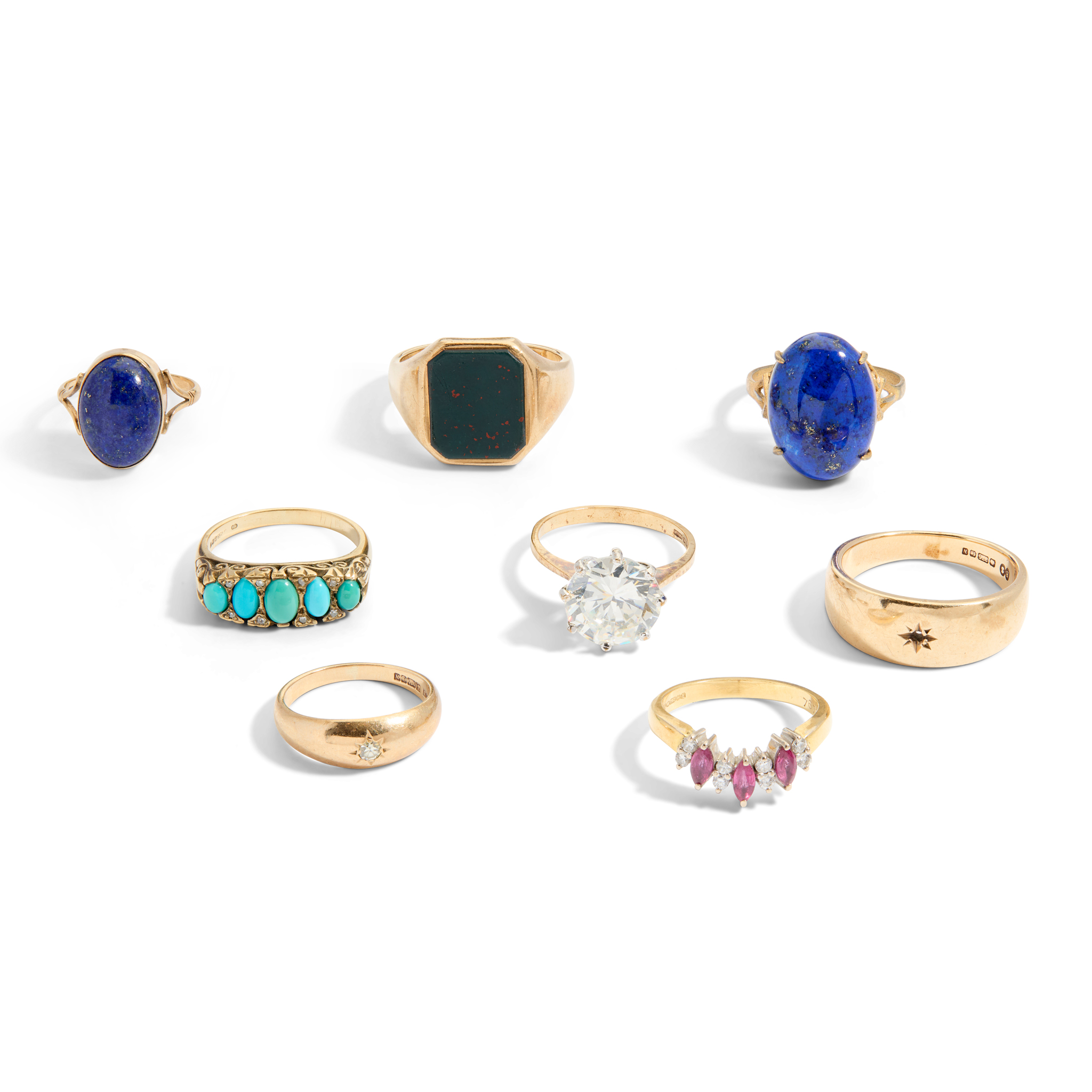 A collection of gem-set rings