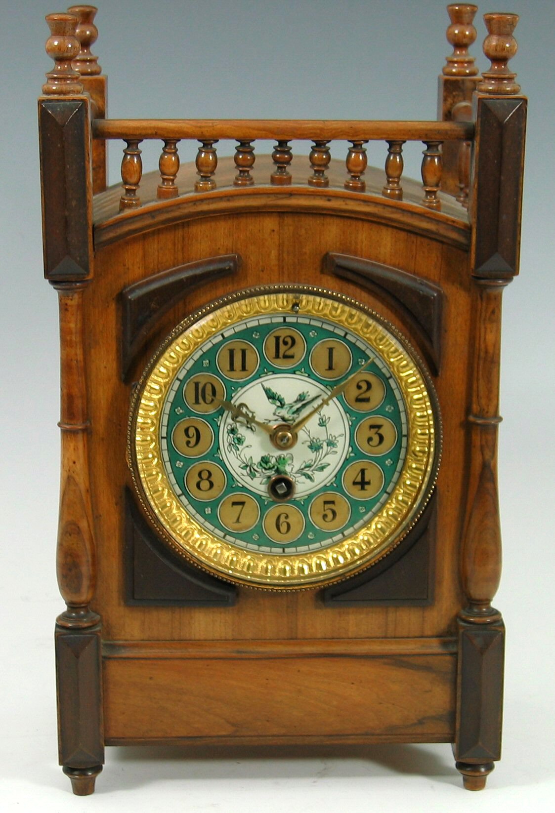 An Aesthetic movement walnut mantel timepiece,