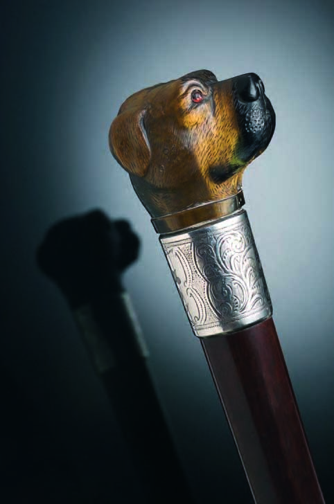 A late 19th century carved tiger's eye dog walking cane,