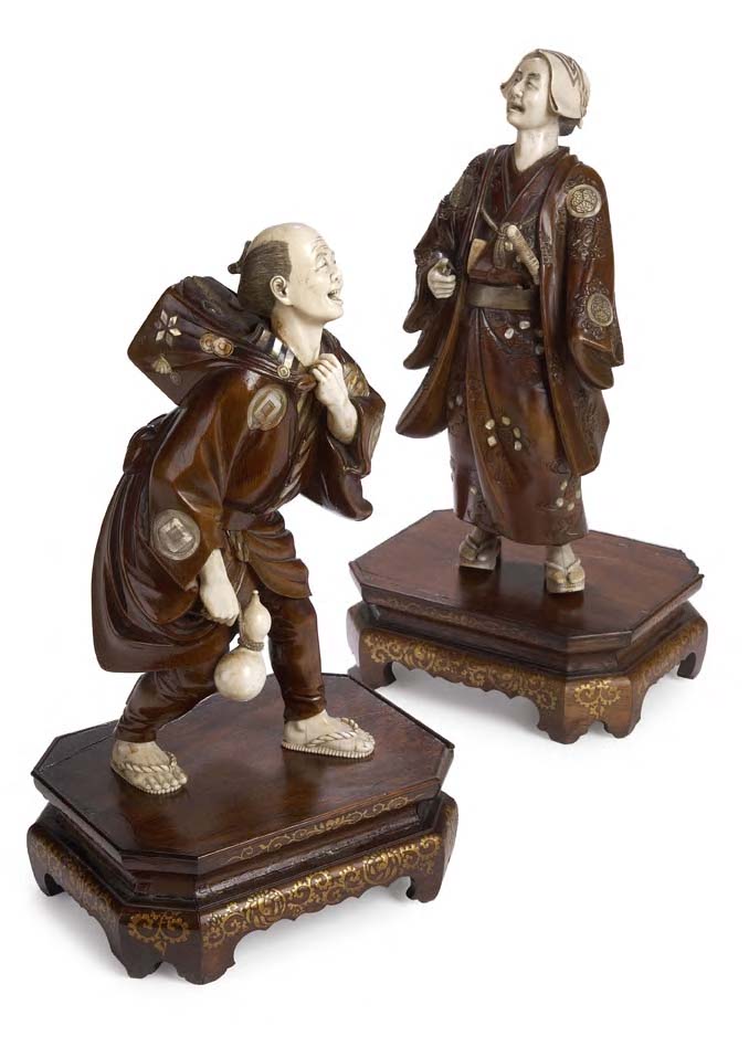 A pair of Japanese carved wood and ivory figures, Meiji period,
