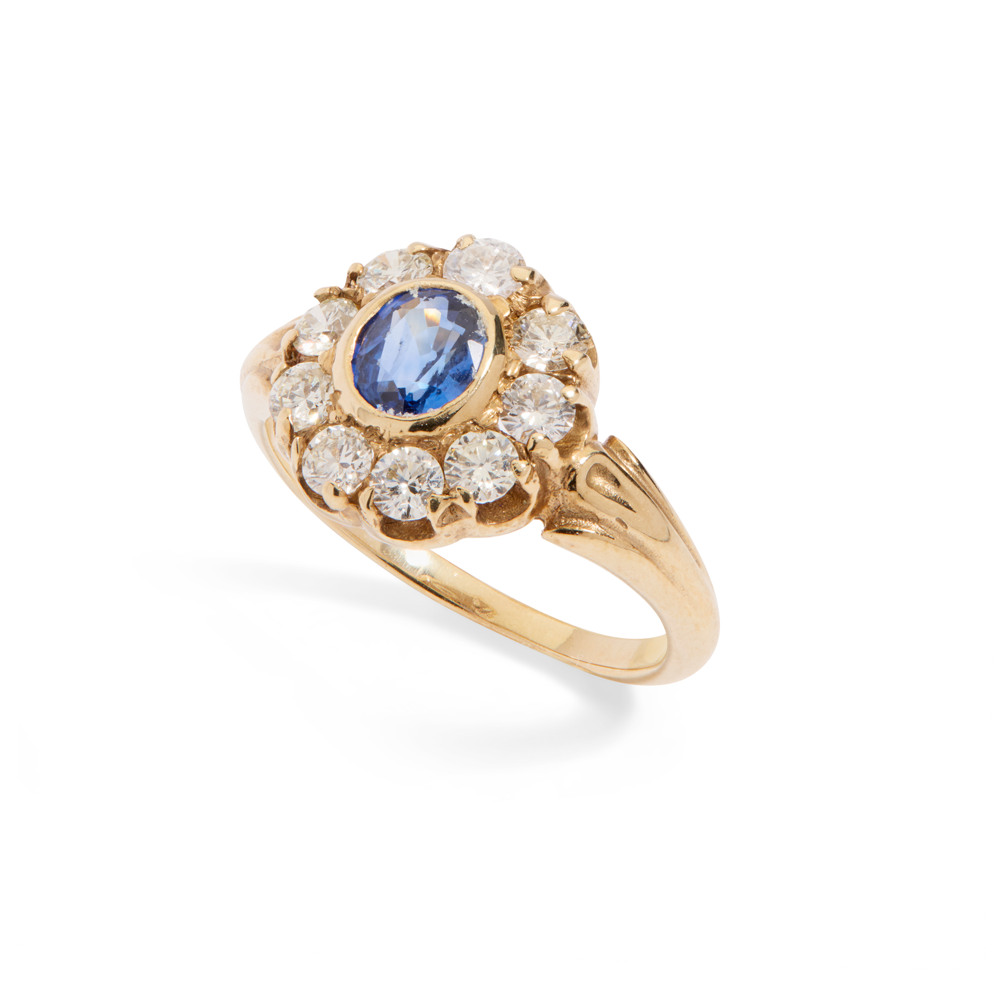 A sapphire and diamond flower cluster ring