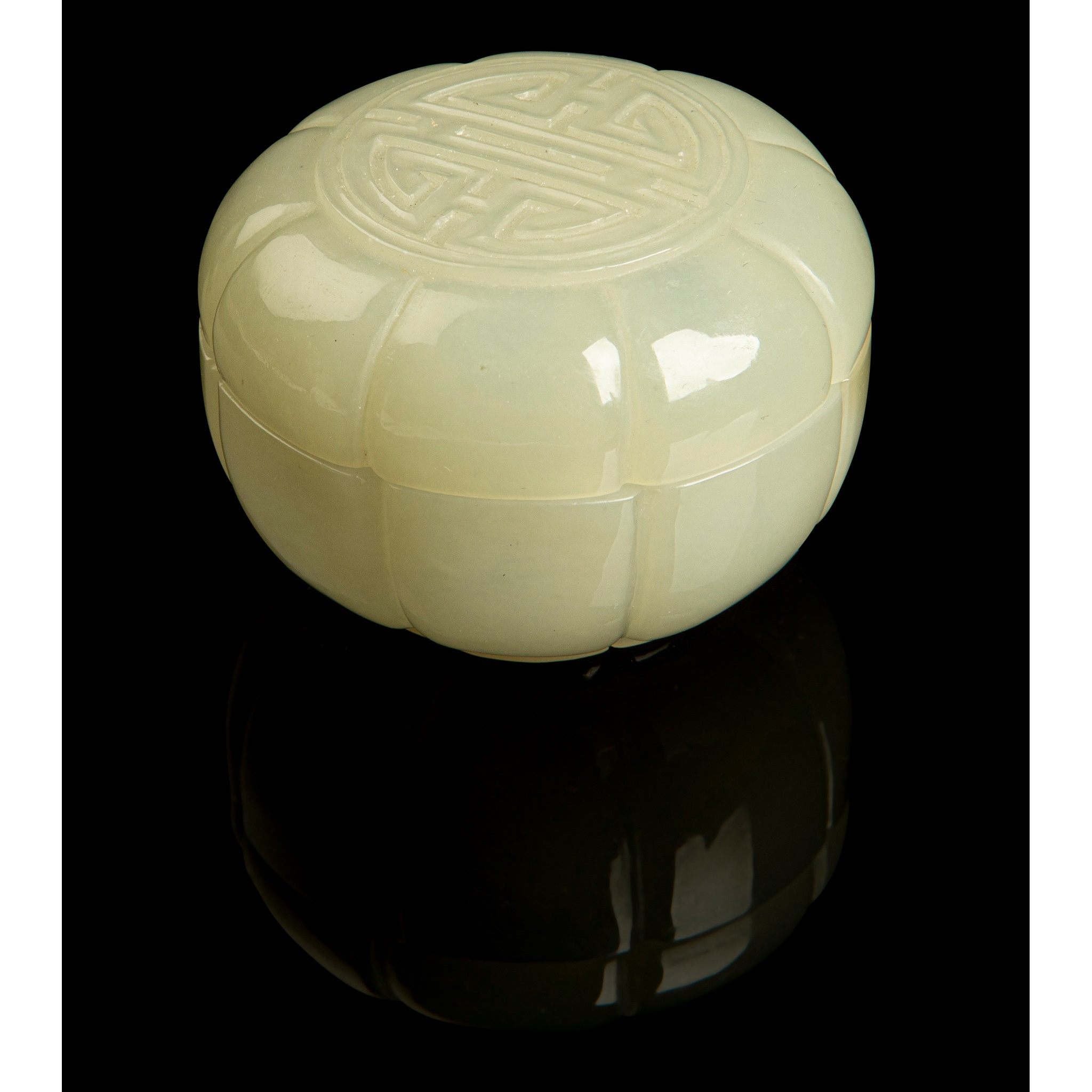 PALE CELADON JADE CARVING OF A FOLIATED BOX AND COVER