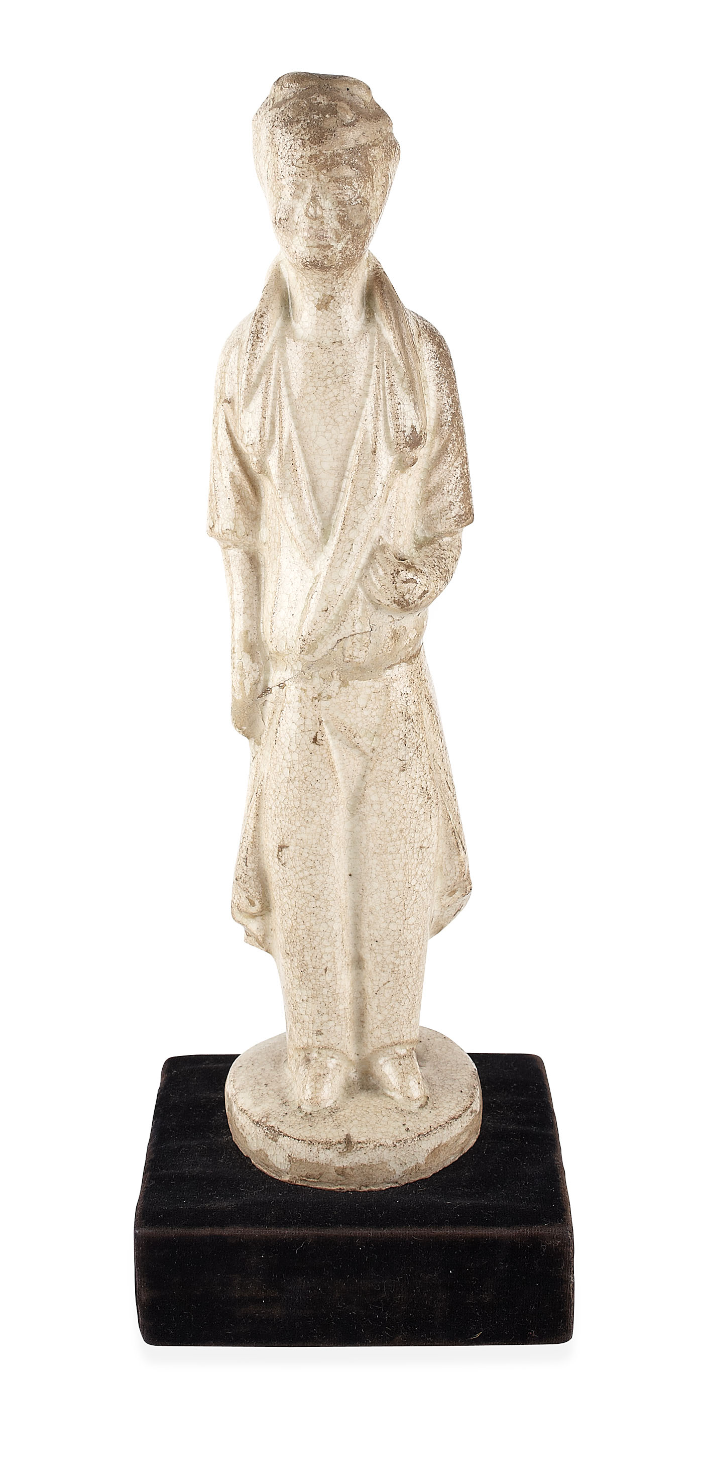 CHINESE WHITE GLAZED POTTERY FIGURE OF AN ATTENDANT