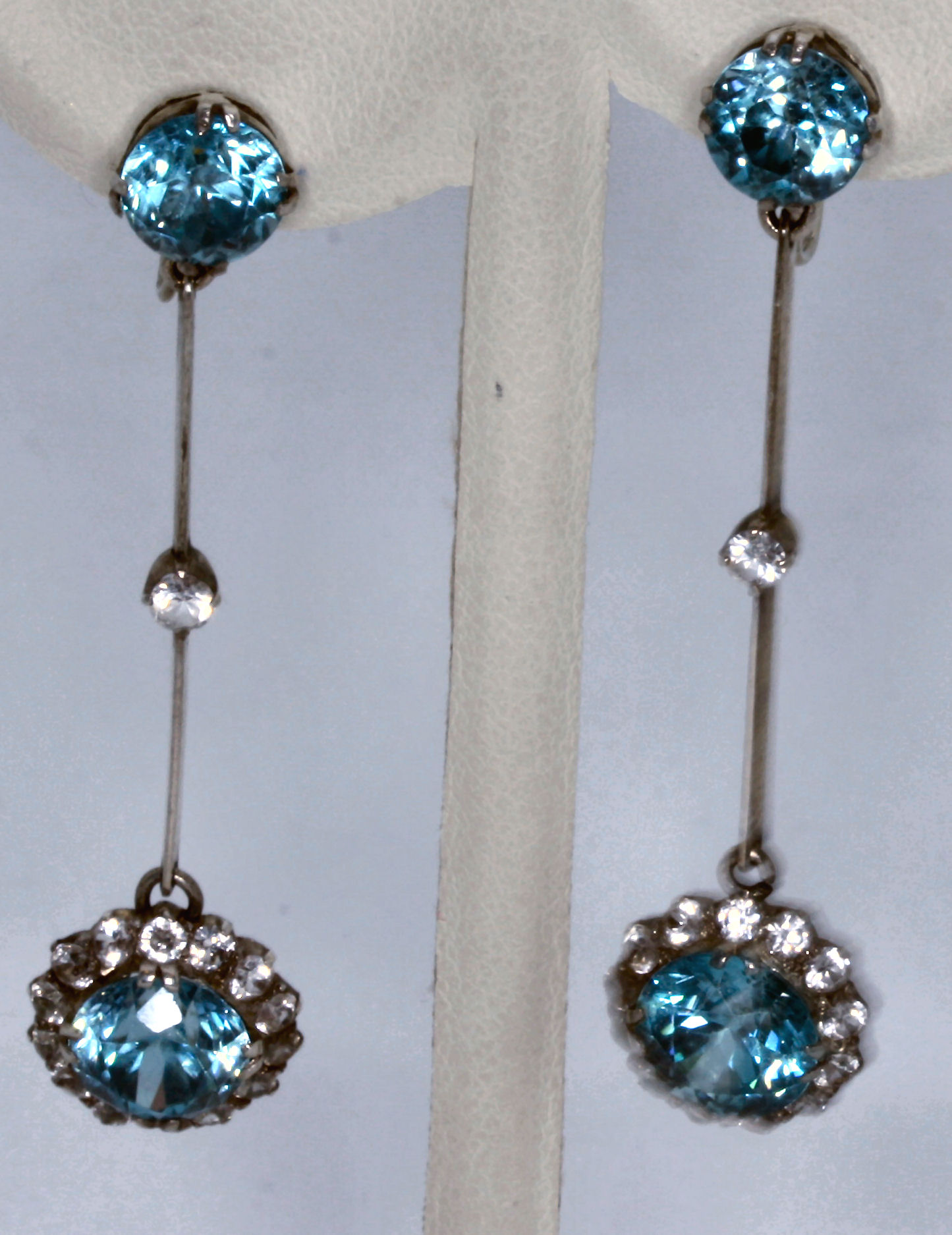 An Edwardian blue and colourless zircon set suite,