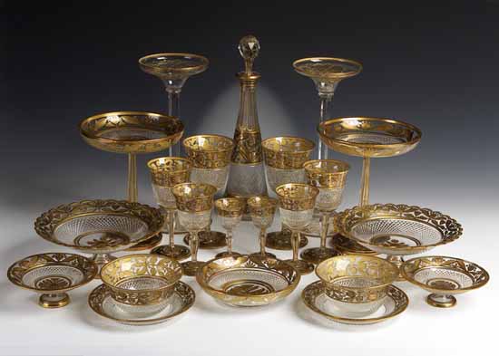 An extensive 20th century French cut glass and gilt service