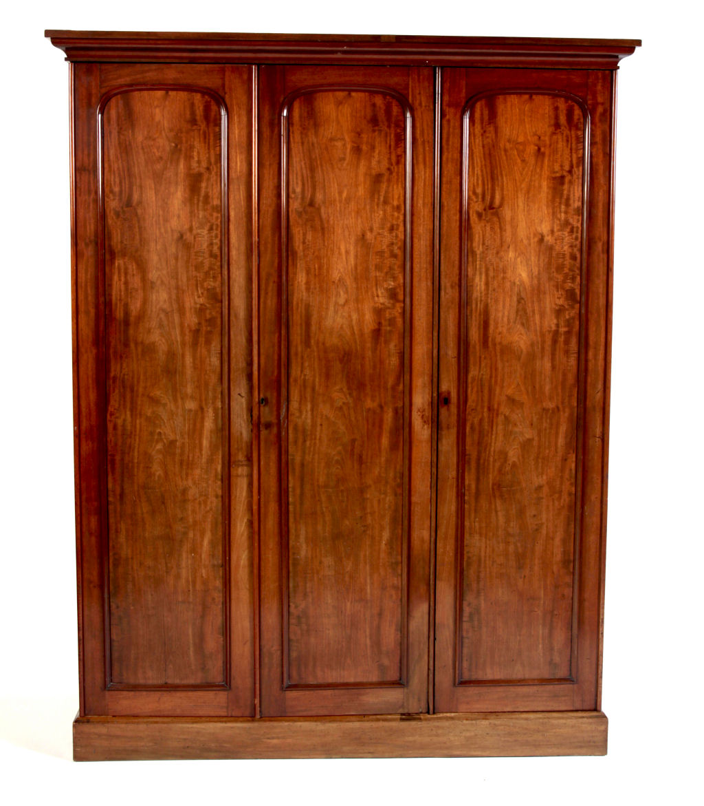 A Victorian mahogany three door wardrobe