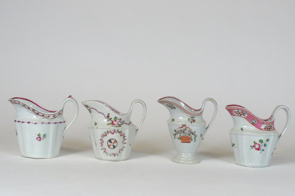 FOUR NEWHALL TYPE POLYCHROME PAINTED JUGS