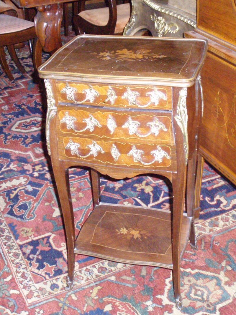 A late 19th/early 20th century French rosewood and inlaid occasional table
