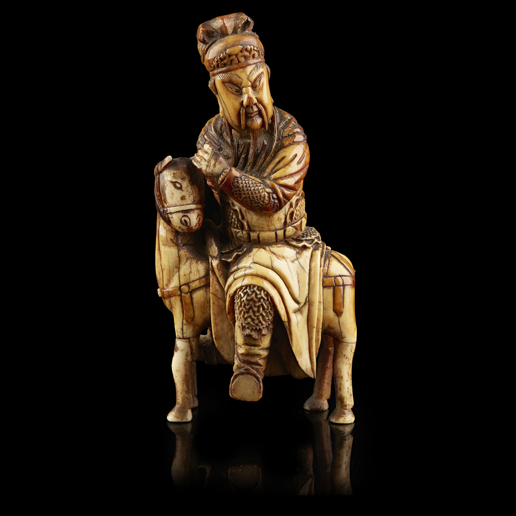 CARVED IVORY EQUESTRIAN FIGURE OF GUANDI