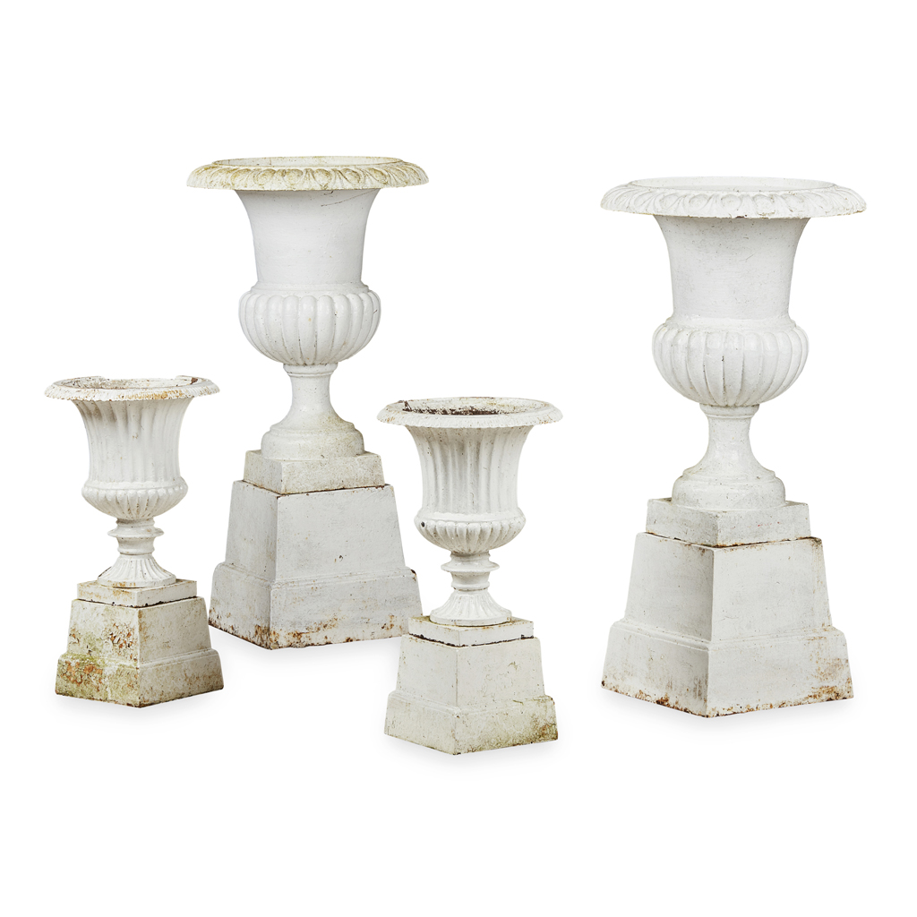 TWO PAIRS OF WHITE PAINTED CAST IRON URNS AND STANDS