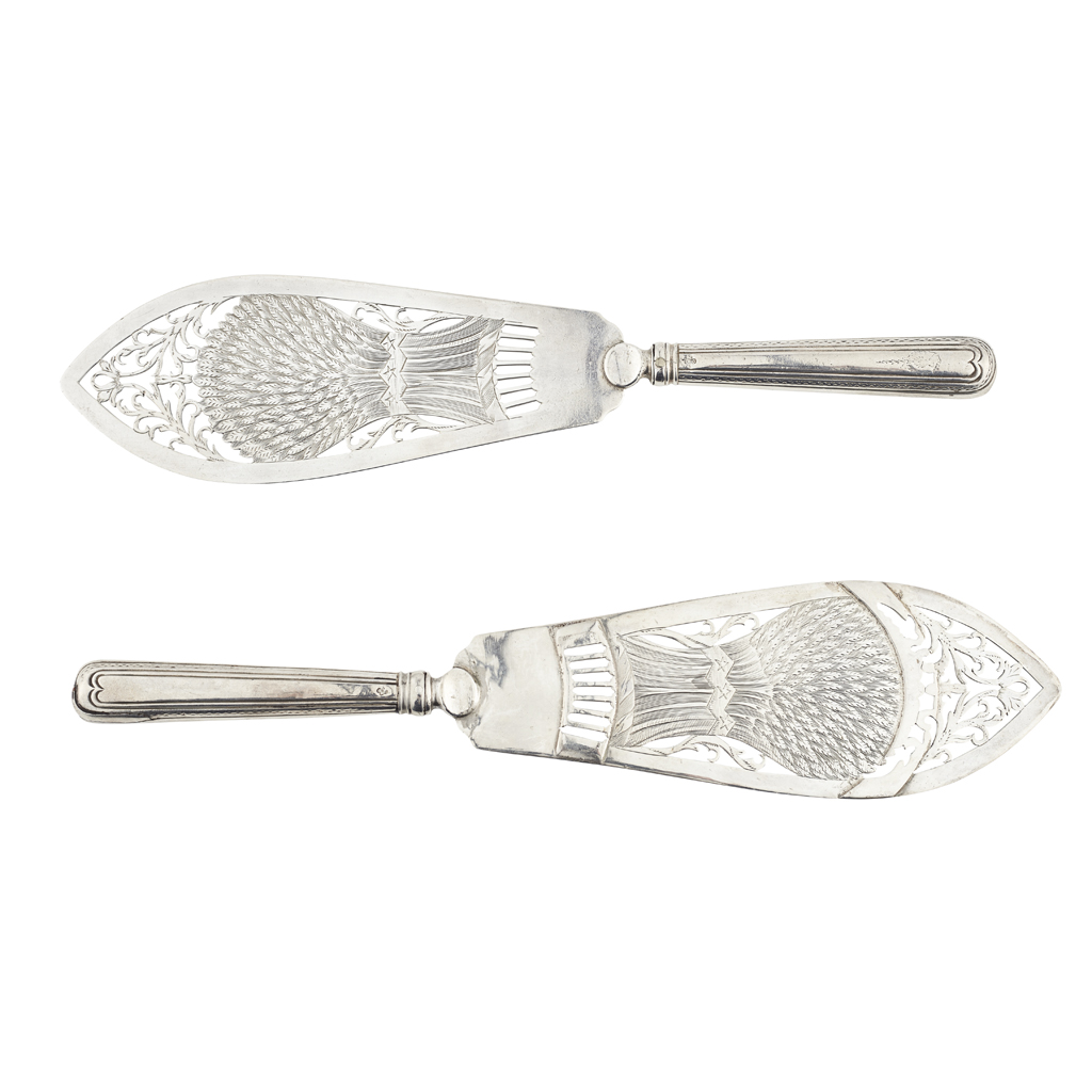 A matched pair of George III silver fish slices
