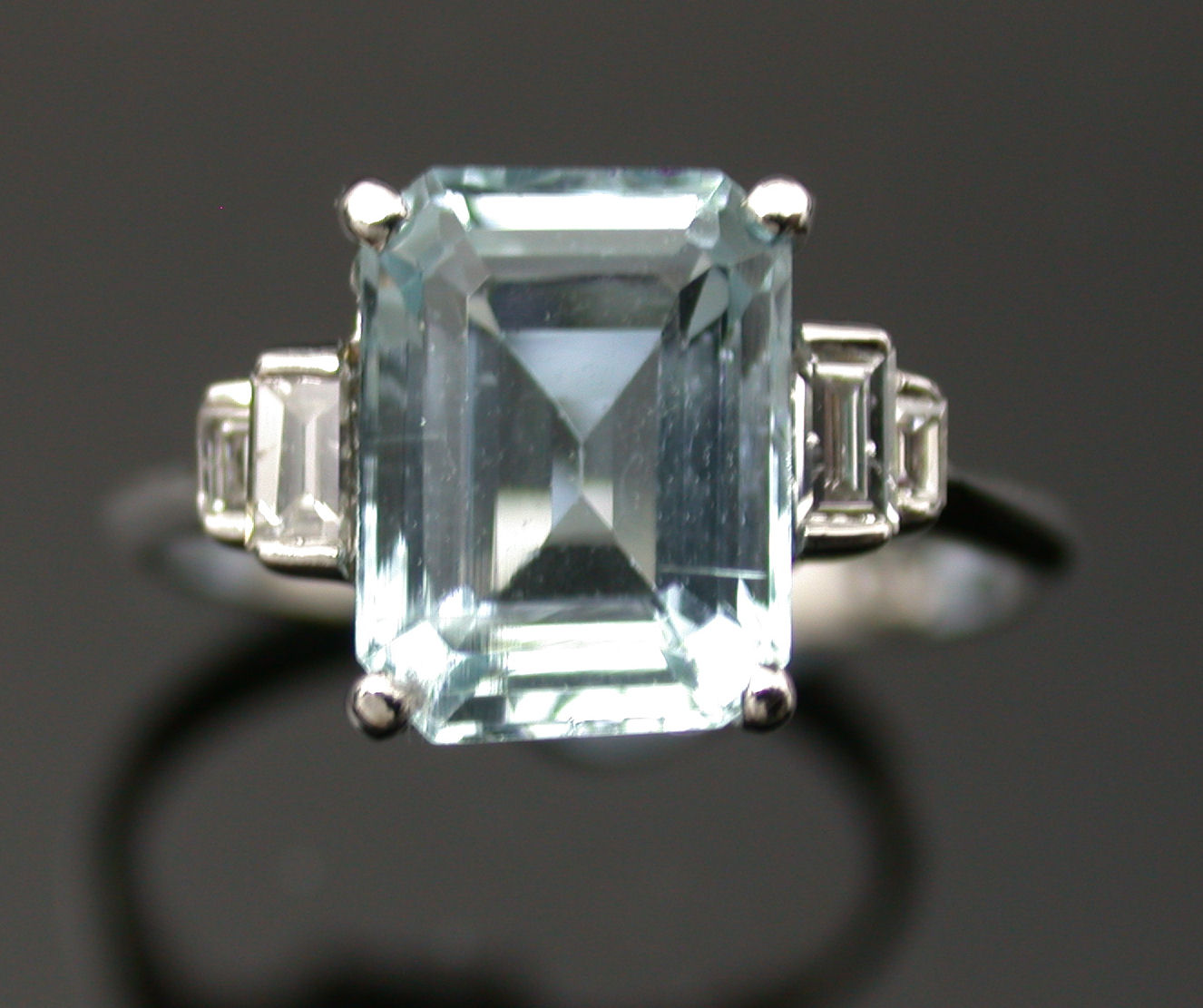 An aquamarine and diamond ring,