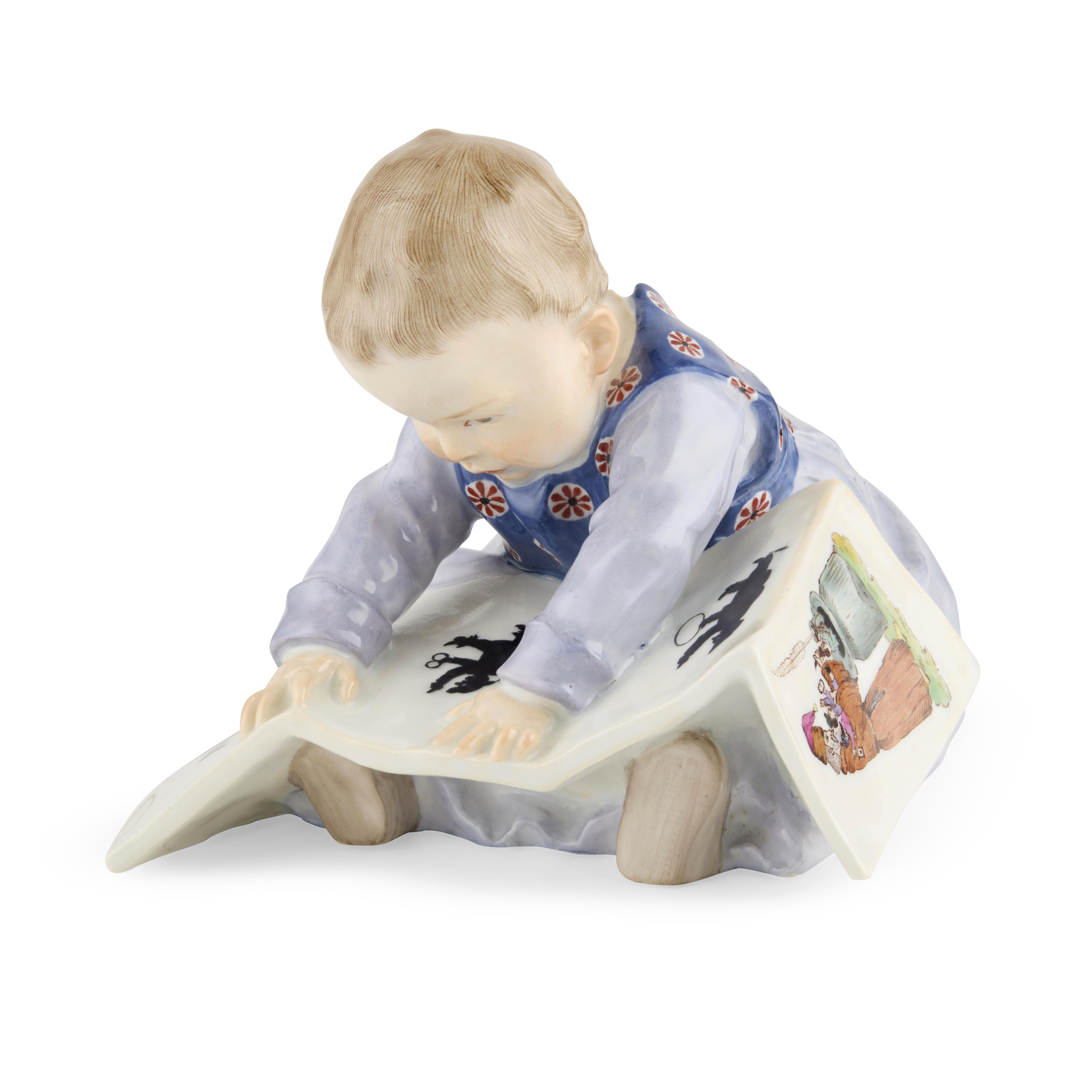 MEISSEN PORCELAIN FIGURE OF CHILD WITH A PICTURE BOOK