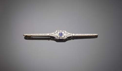 An early 20th century sapphire and diamond bar brooch,