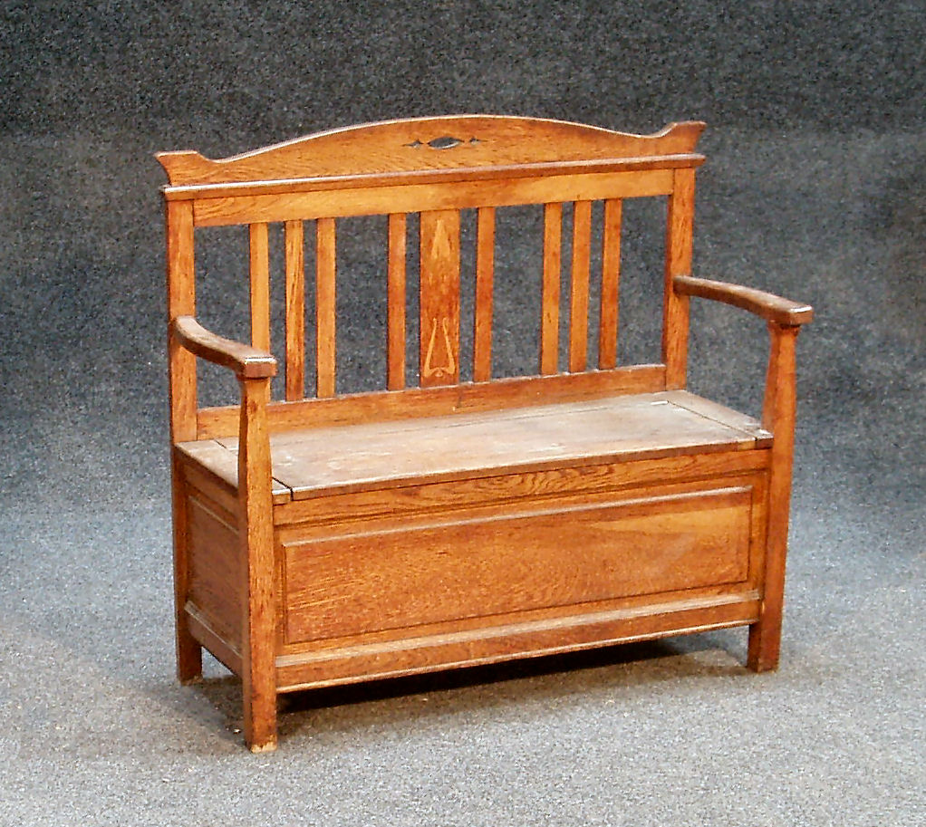 A Victorian oak settle