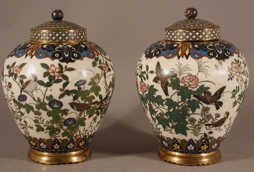 A pair of Chinese cloissone brass mounted baluster vases and covers