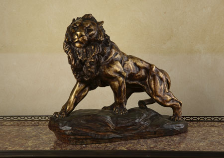A Belgian bronzed terracotta model of a lion