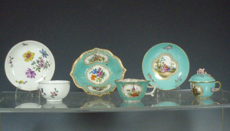 A group of Meissen cups and saucers