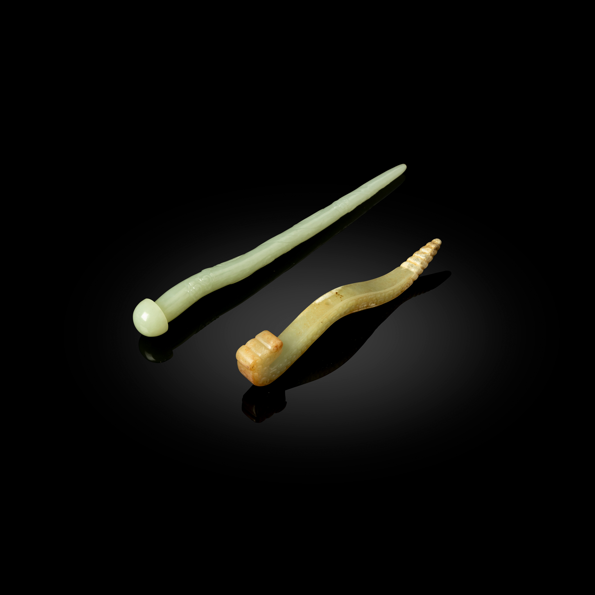 TWO CHINESE CELADON JADE HAIRPINS