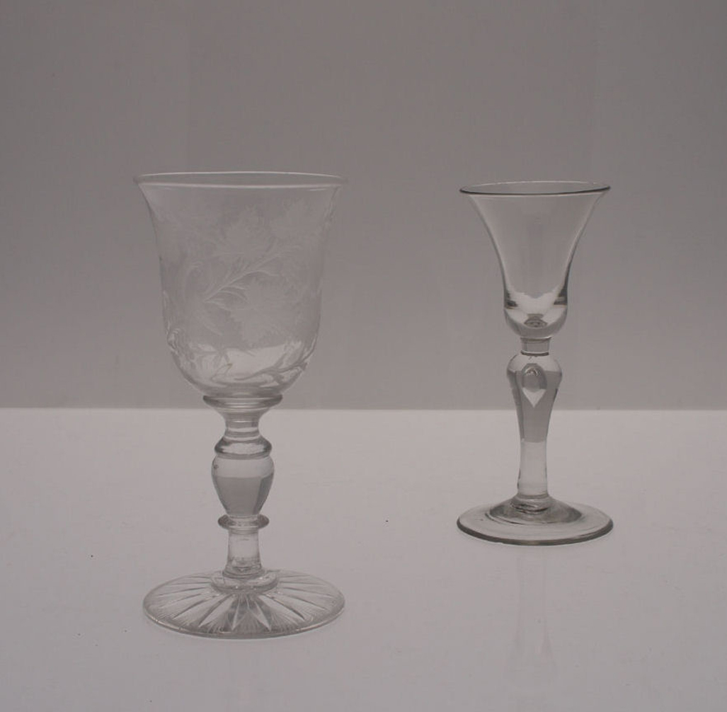 An 18th century single knop trumpet bowl wine glass
