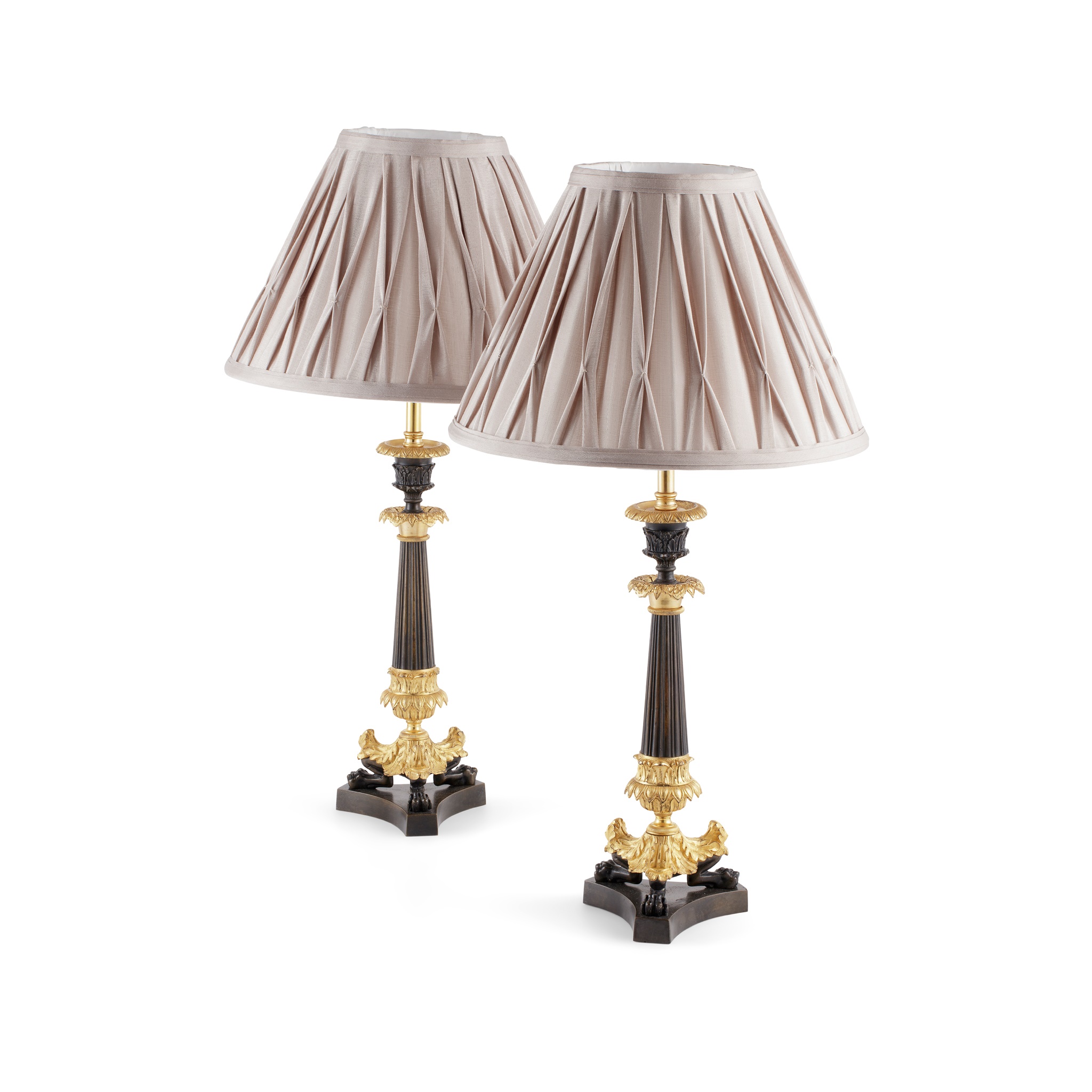 PAIR OF GILT AND PATINATED BRONZE LAMPS