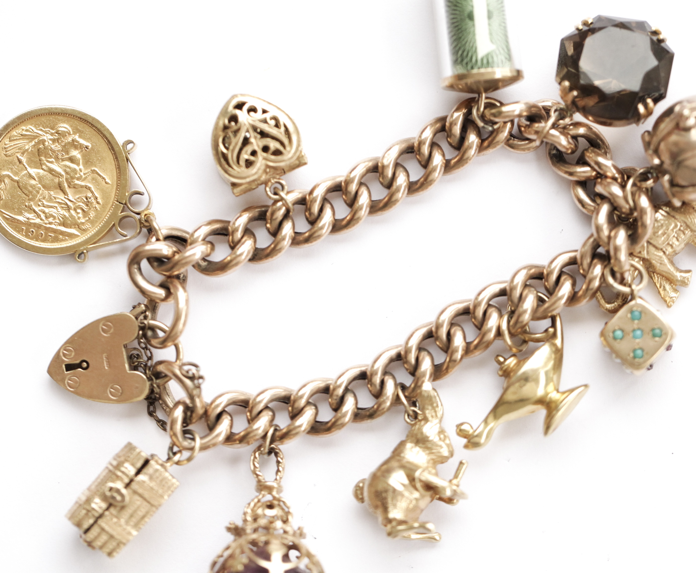 A 9ct gold charm bracelet