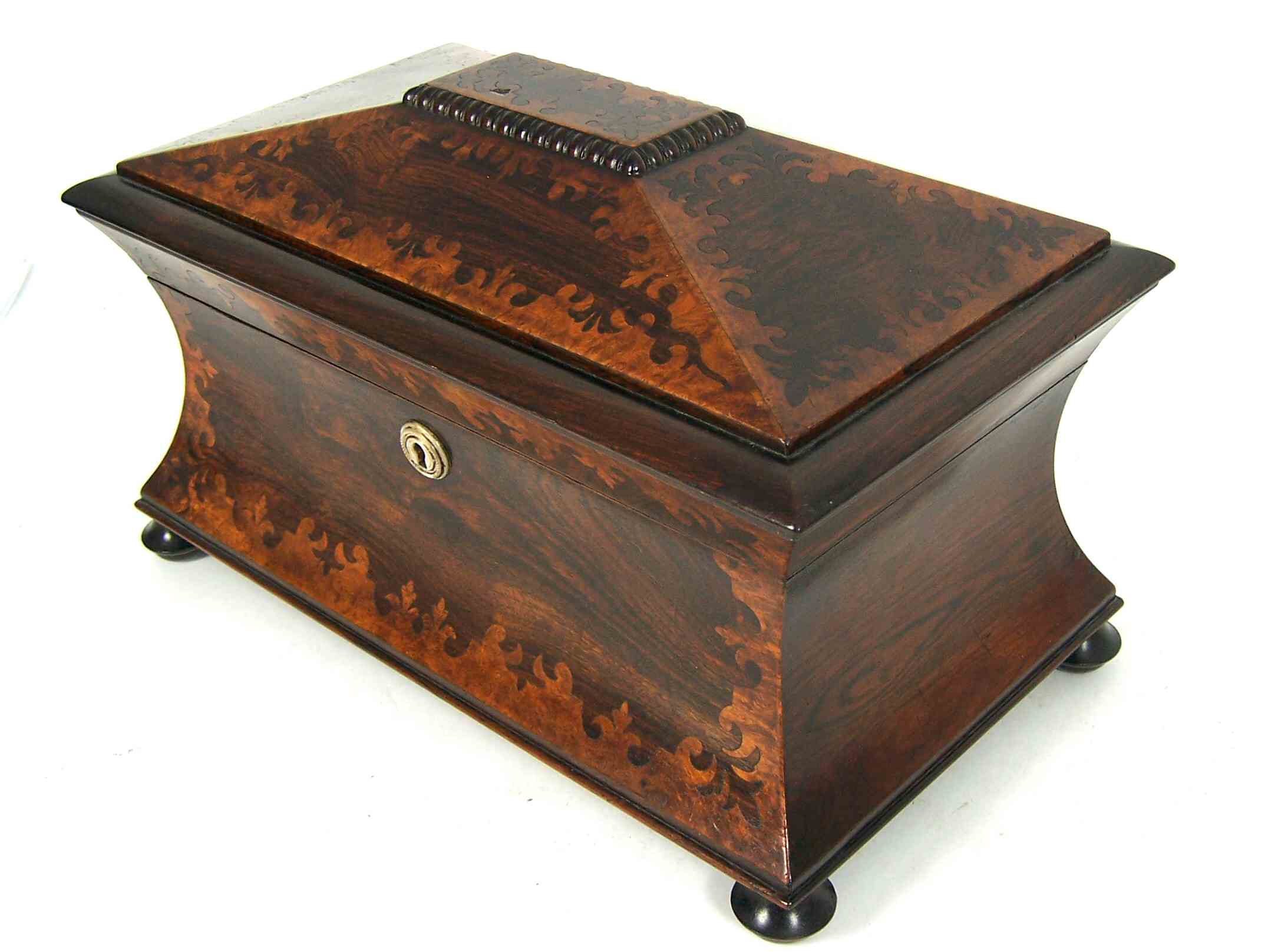 A Victorian rosewood and burr walnut tea caddy