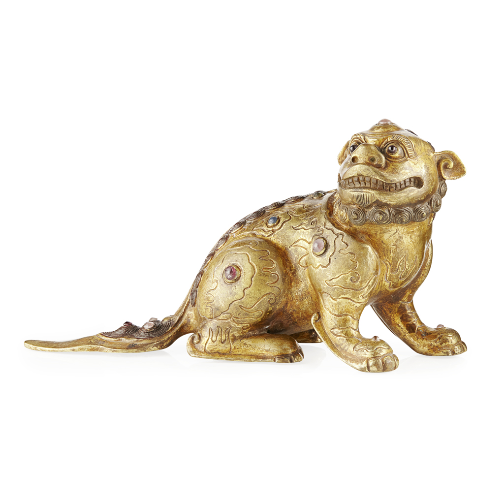GILT-BRONZE BUDDHIST LION