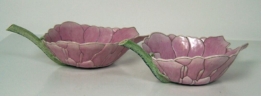 A pair of early 20th century Chinese famille rose lotus cups