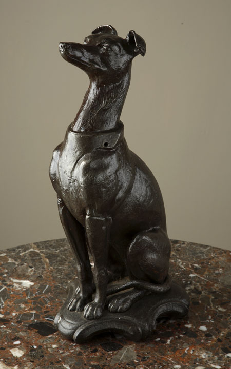 A Victorian cast iron and painted model of a greyhound