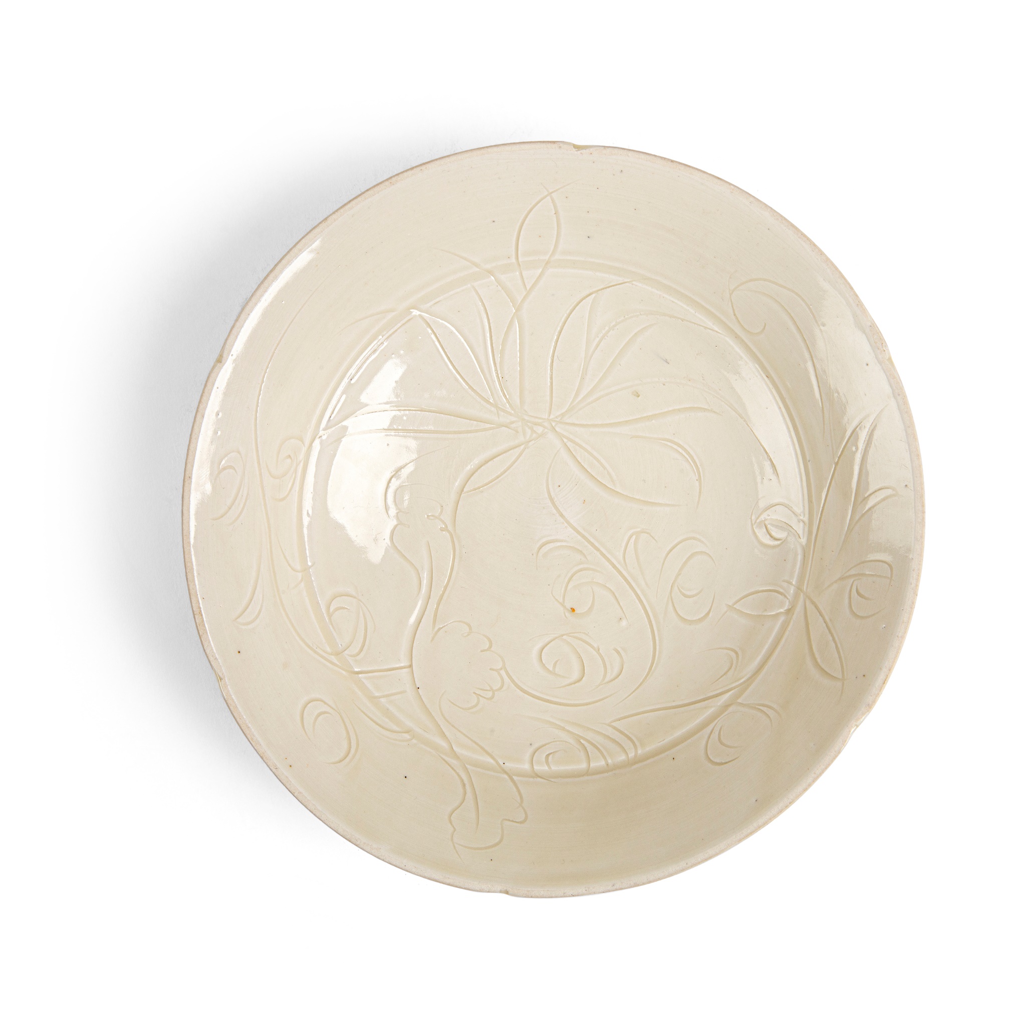 DING WARE CARVED 'DAY LILY' BOWL