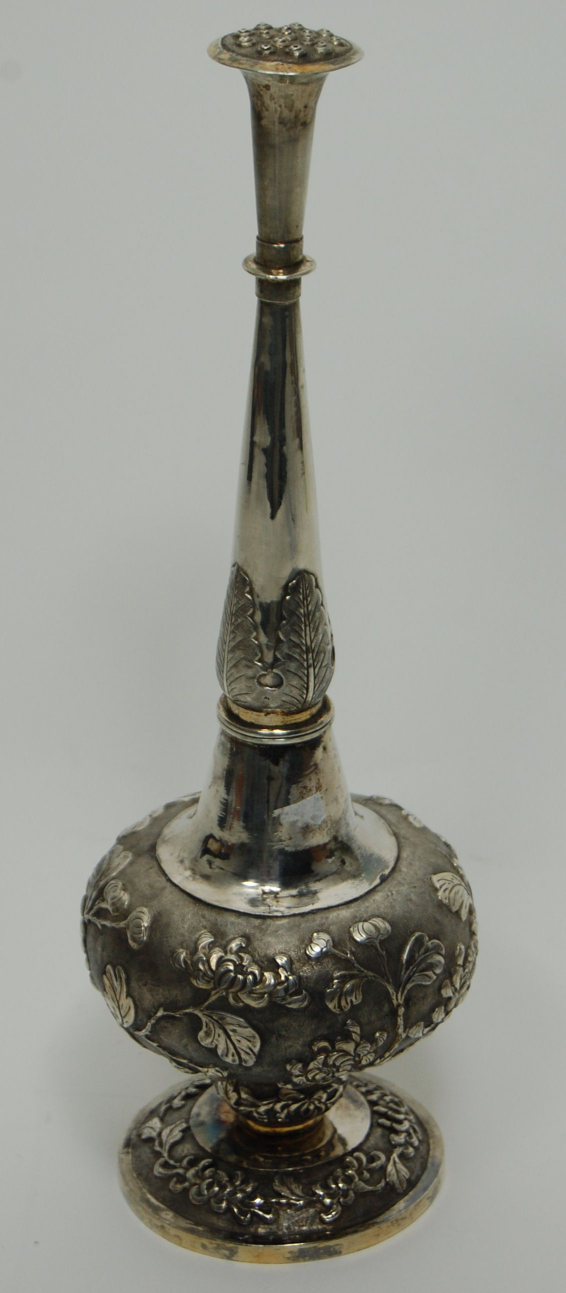 An eastern rose water sprinkler