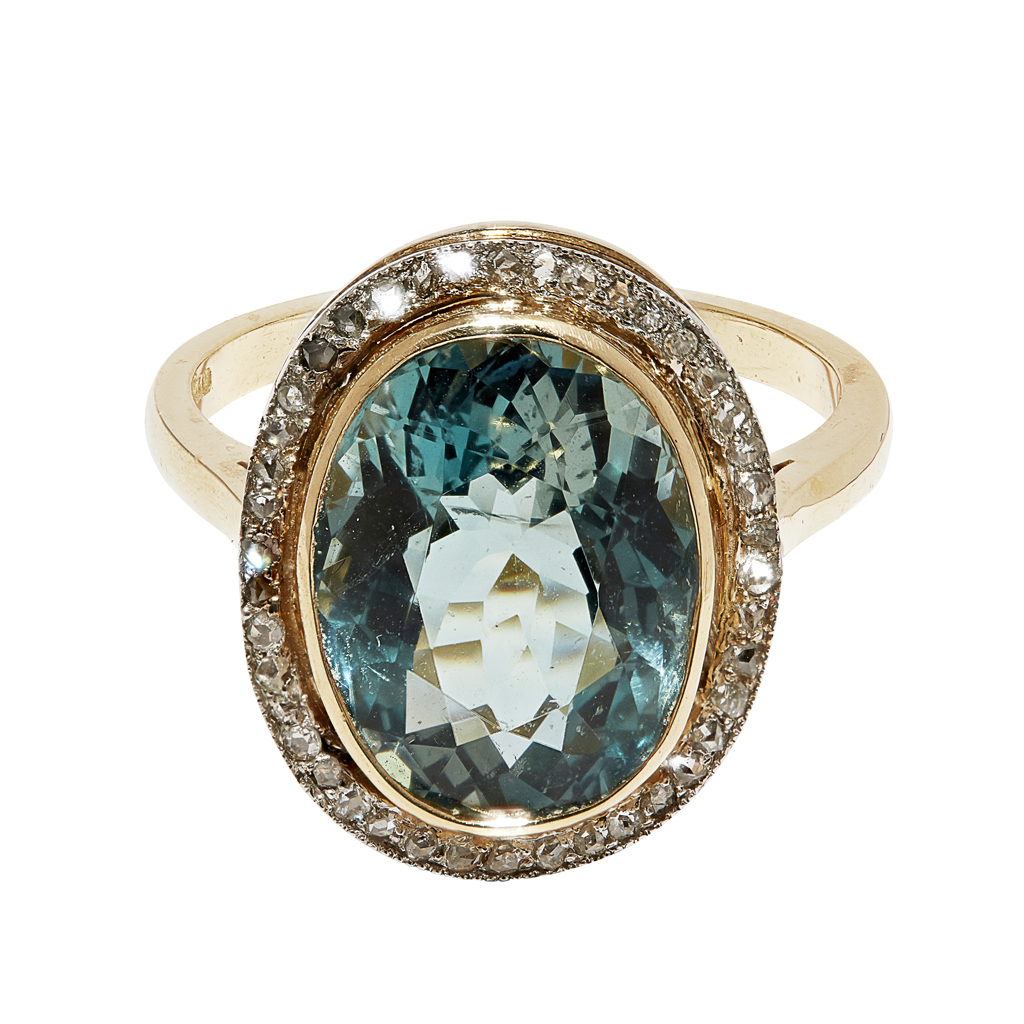 An aquamarine and diamond set ring