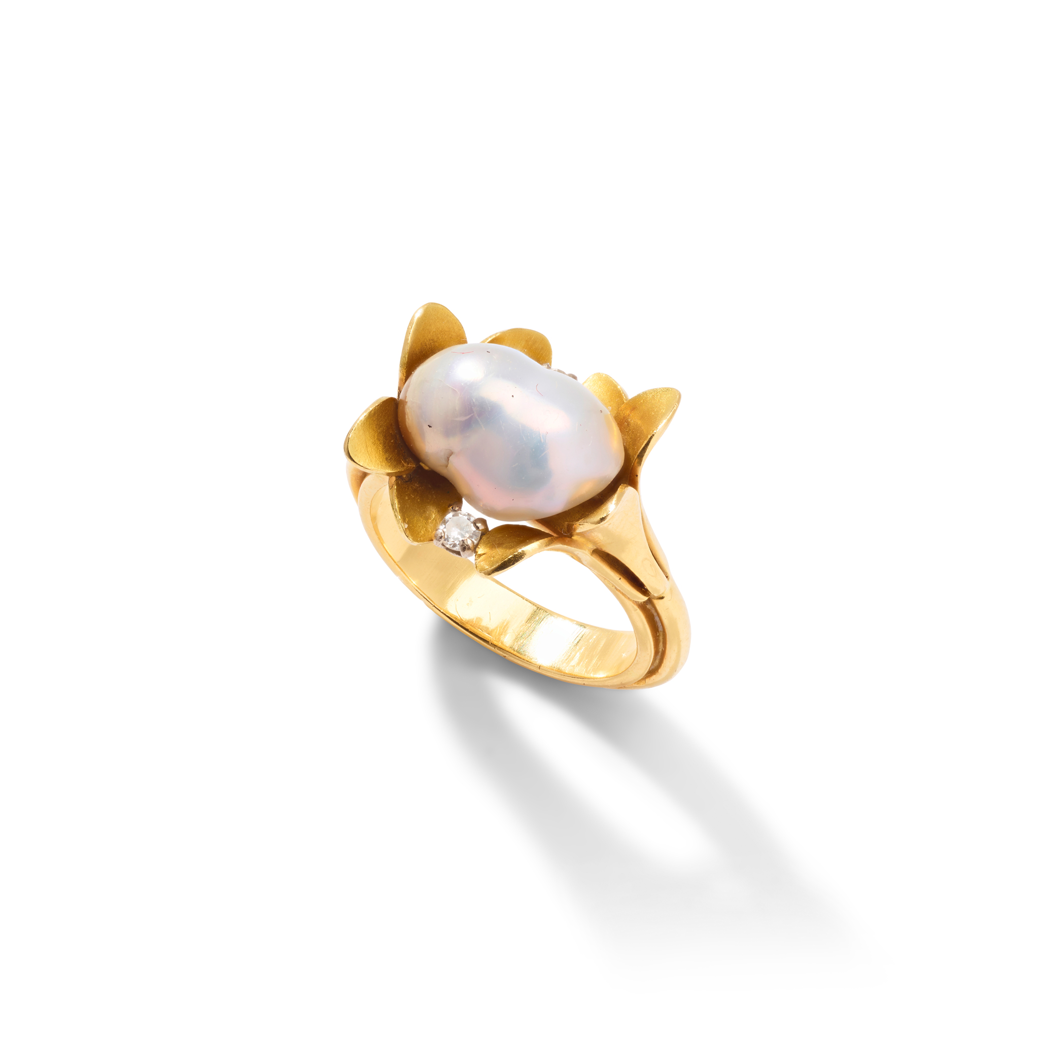 Roger Doyle for Cairncross of Perth: An 18ct gold Scottish freshwater pearl and diamond ring