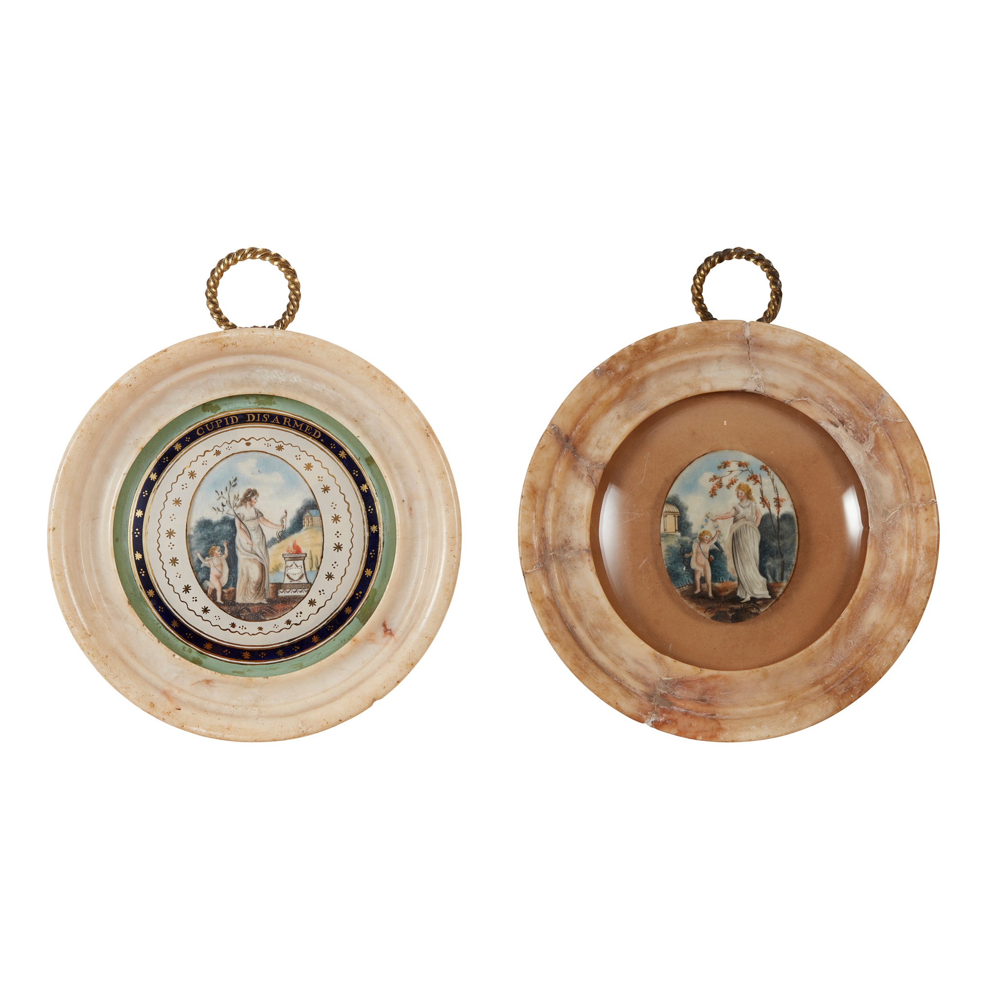 TWO ALABASTER FRAMED ROUNDELS OF VENUS AND CUPID