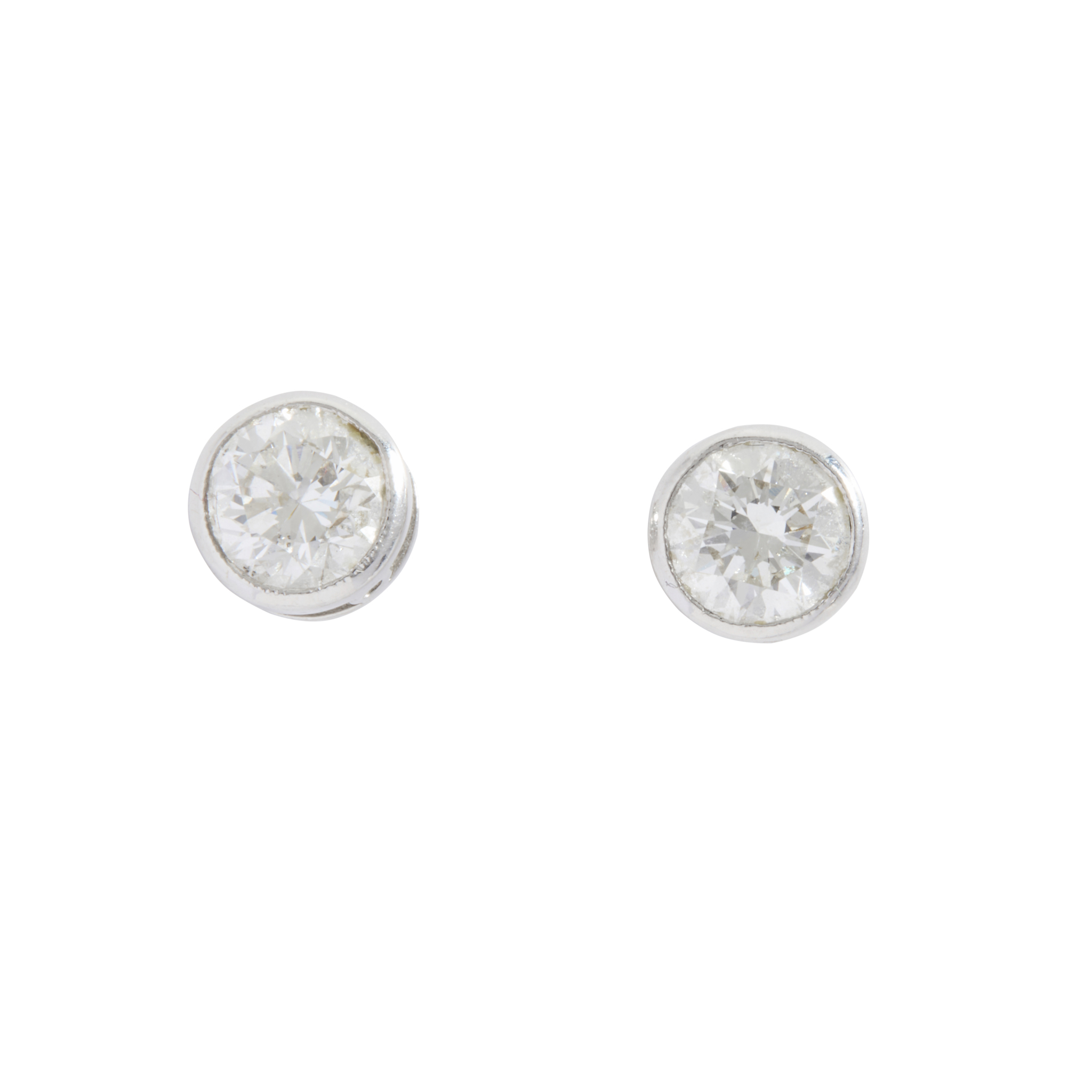 A pair of diamond stud earrings