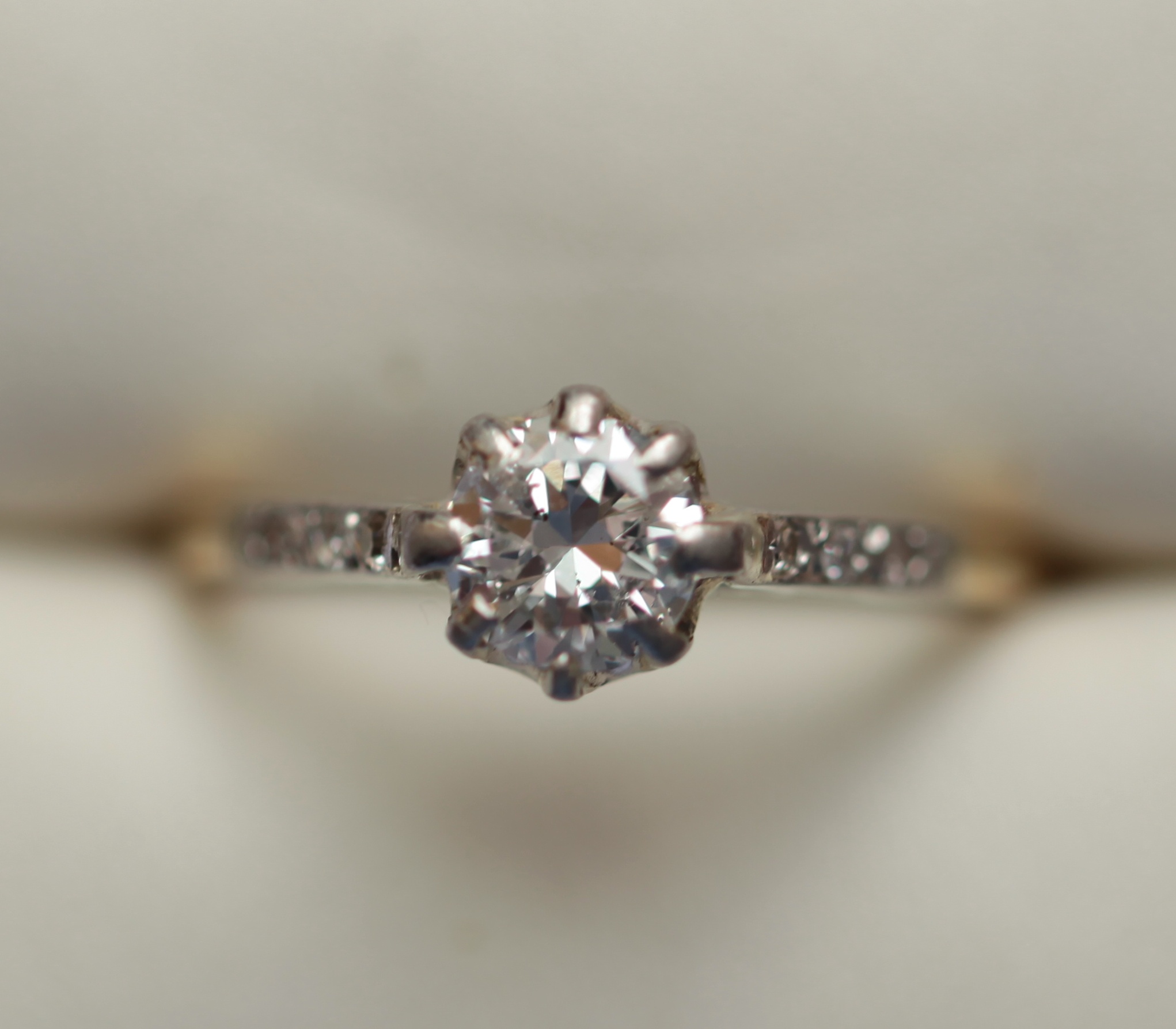 An 18ct gold and platinum mounted diamond single-stone ring