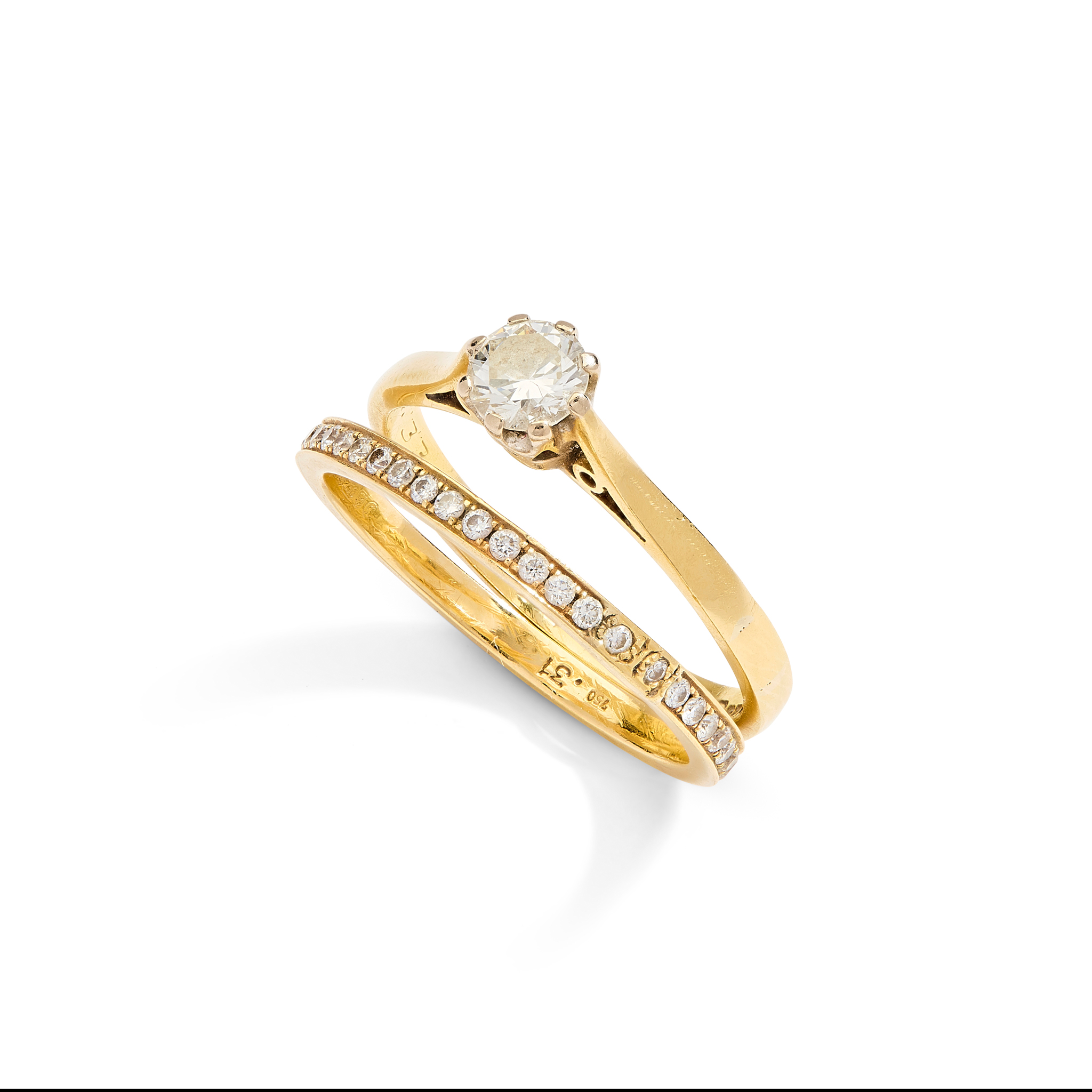 An 18ct gold single-stone diamond ring and a diamond band