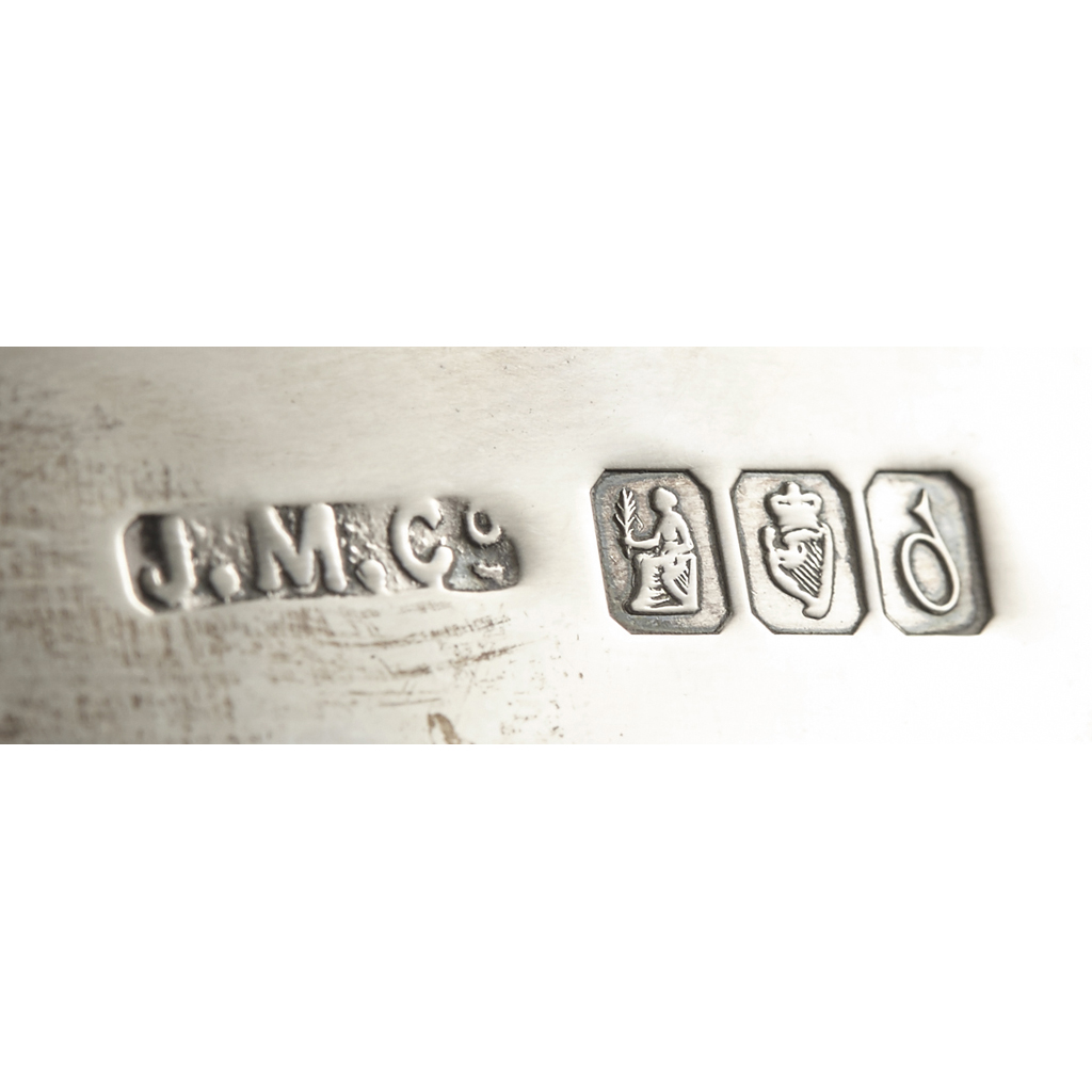 A pair of Irish wine coasters