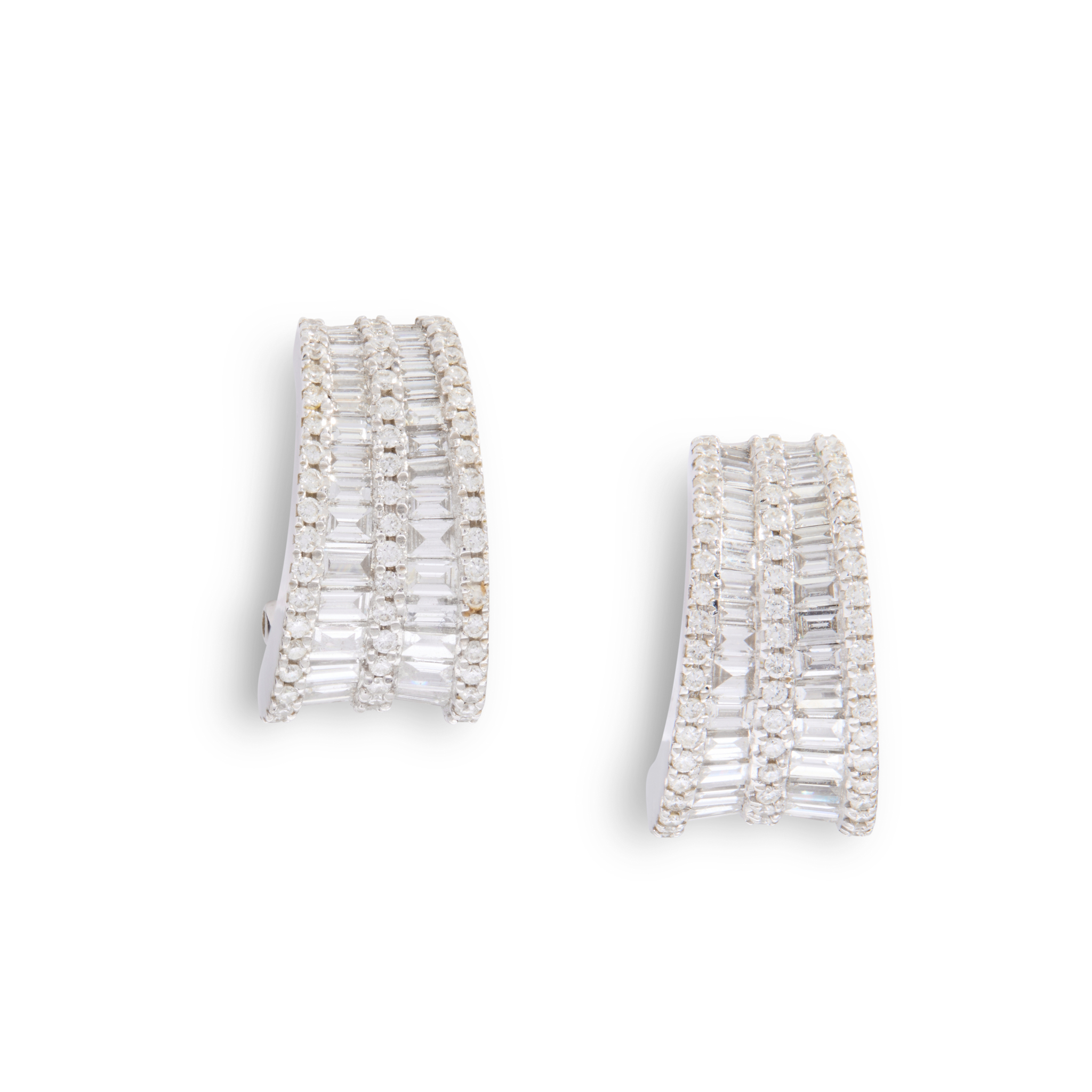 A pair of diamond hoop earrings