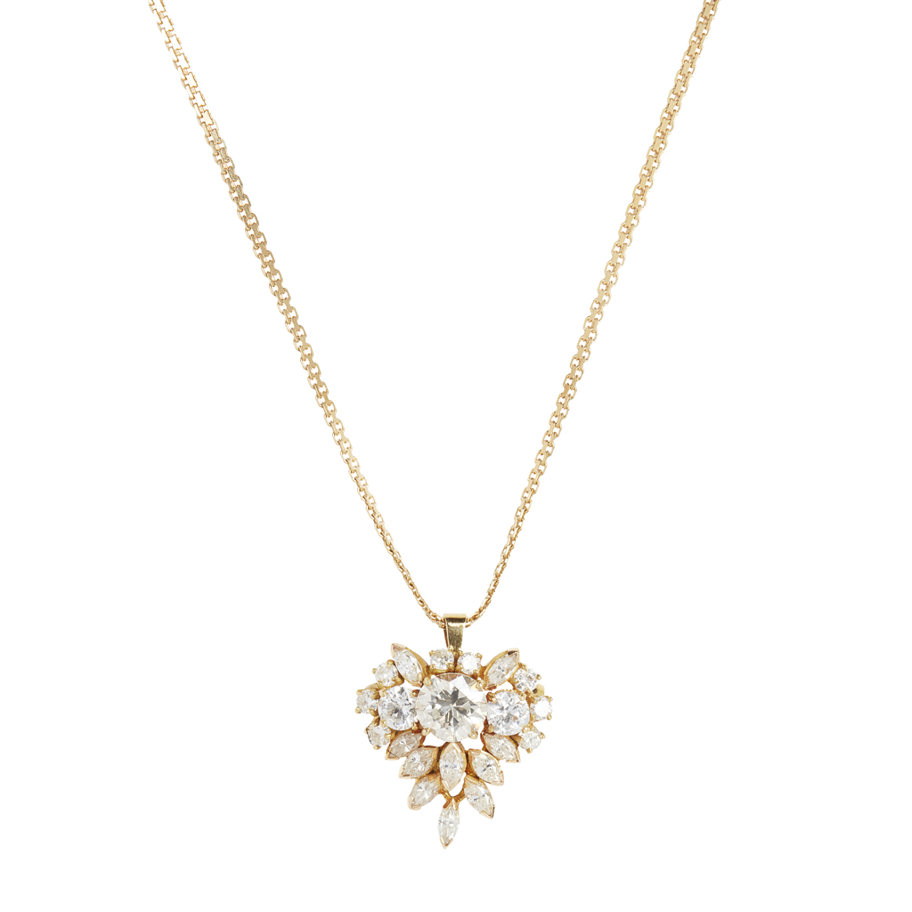 A diamond set cluster pendant brooch