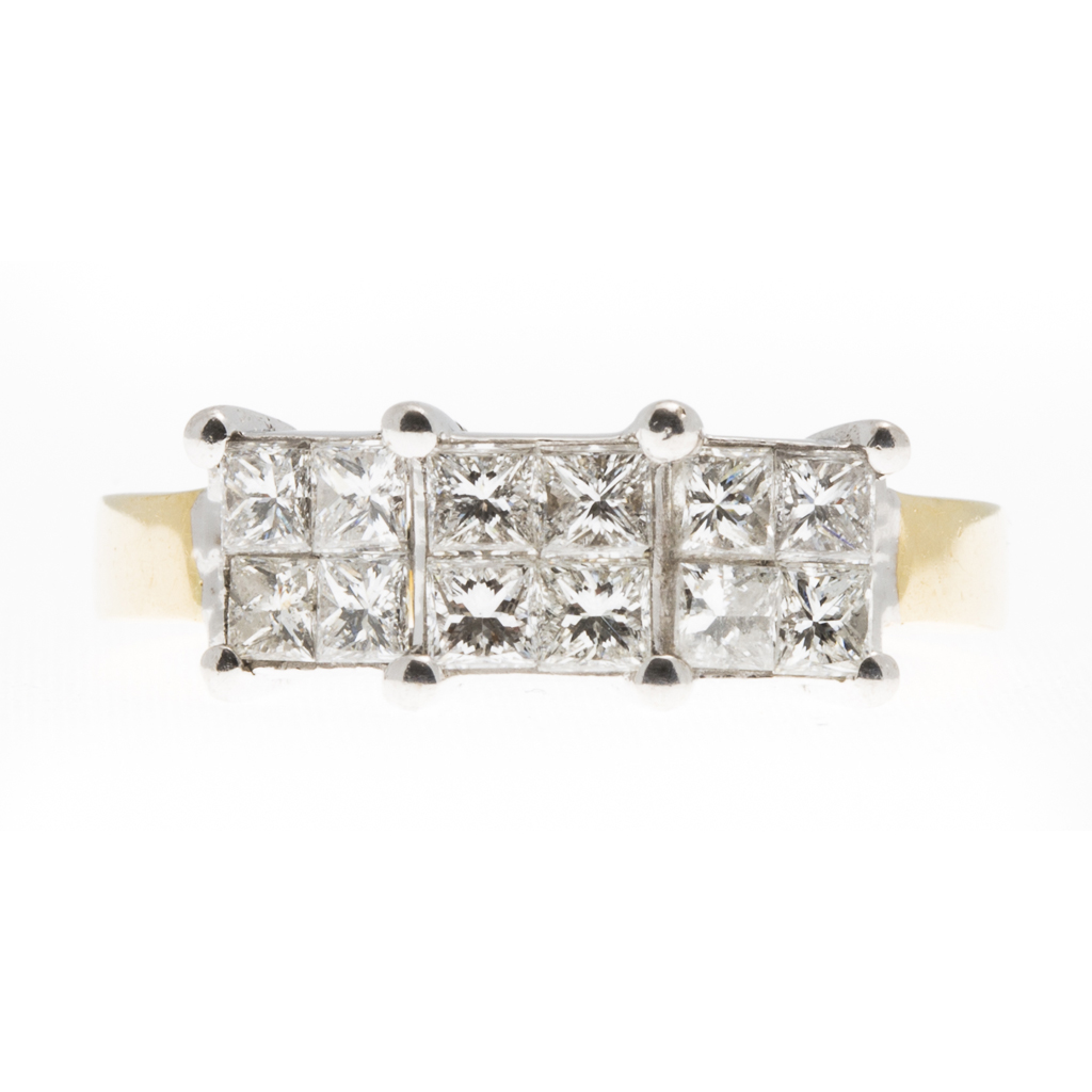 An 18ct gold diamond set triple cluster ring