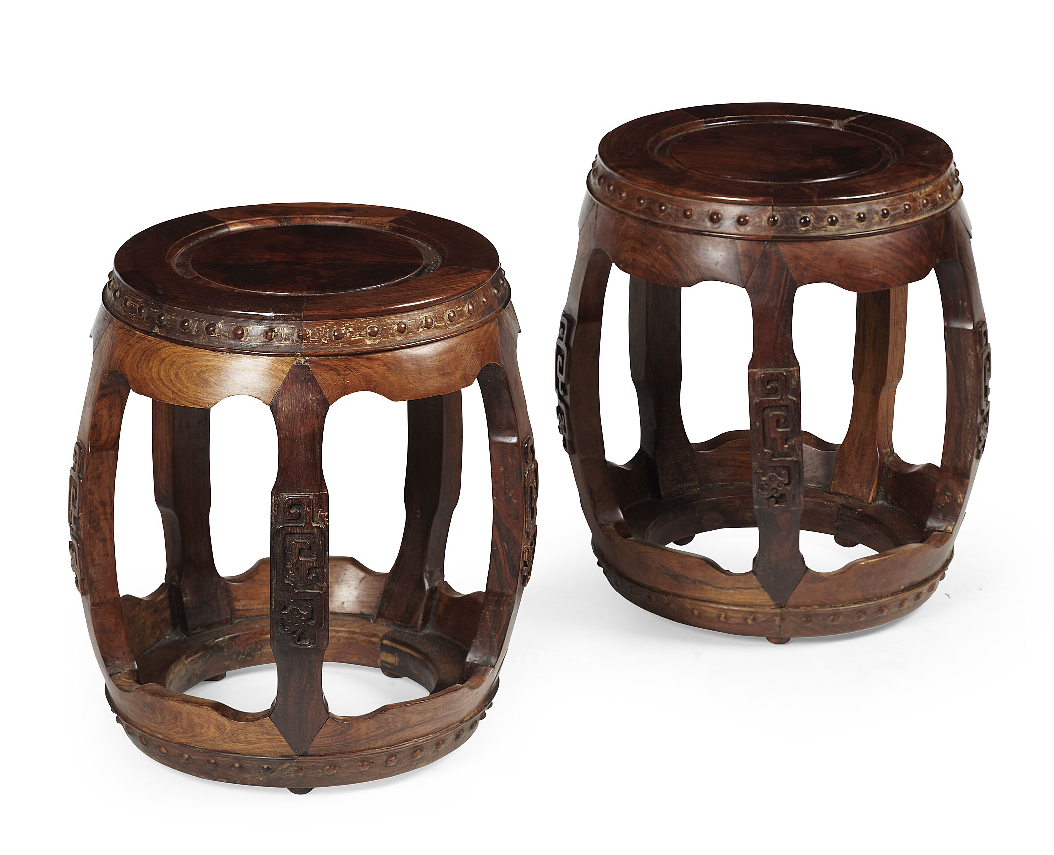 PAIR OF CHINESE HUANG HUALI CARVED BARREL FORM STOOLS