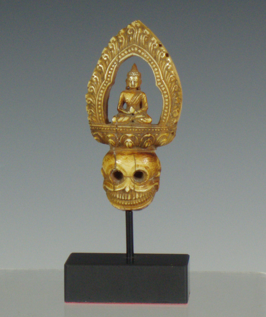 A 19th century carved ivory finial